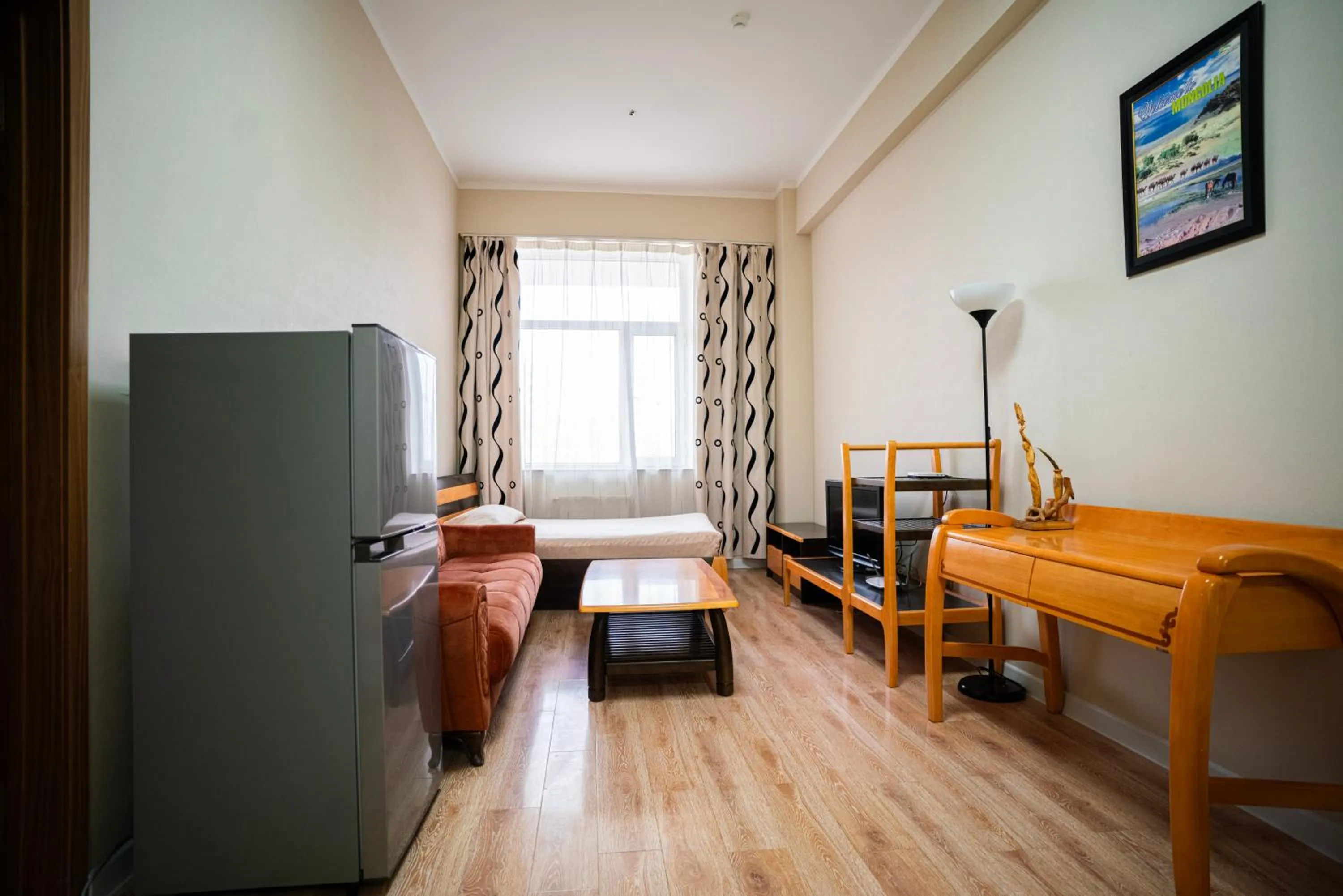 Bed in Tsolmon's Serviced Apartments