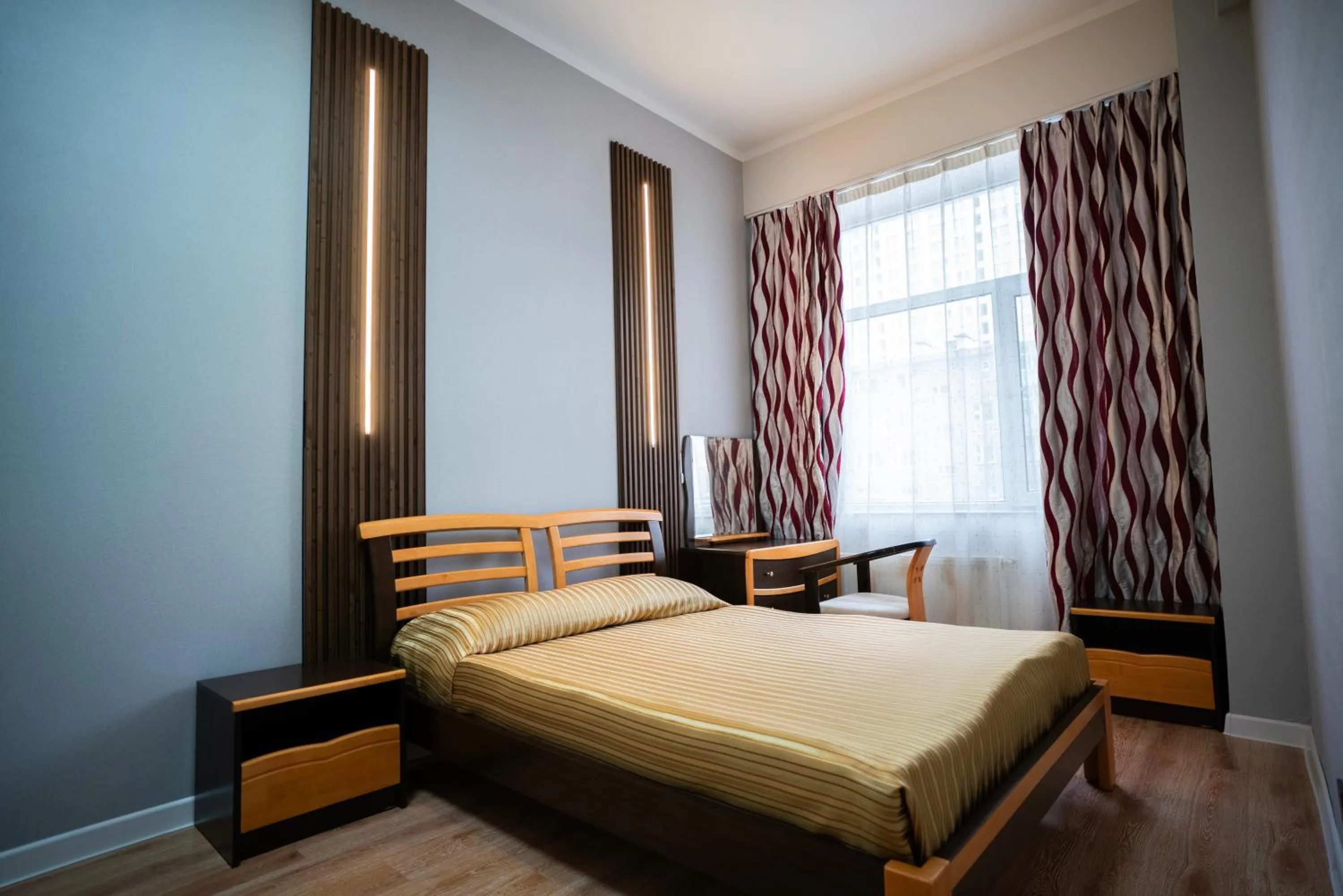 Bed in Tsolmon's Serviced Apartments