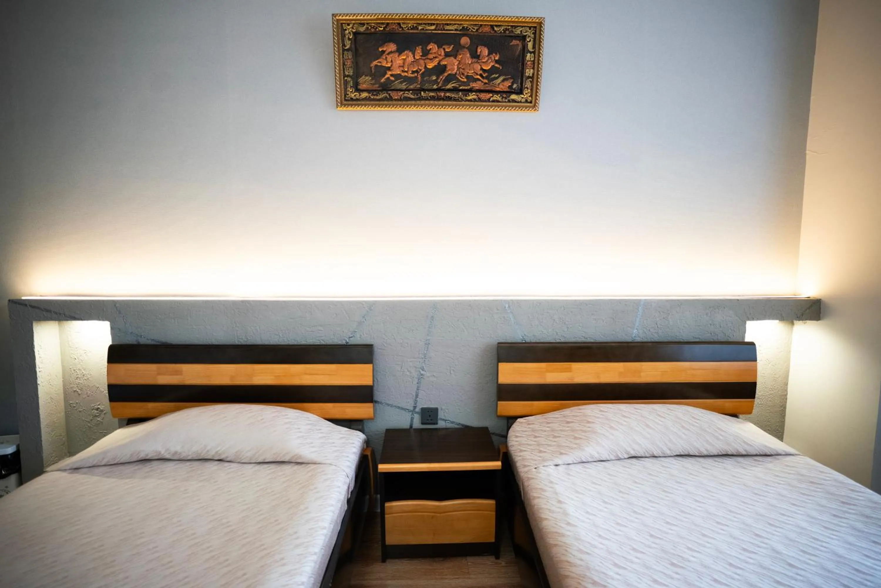 Bed in Tsolmon's Serviced Apartments