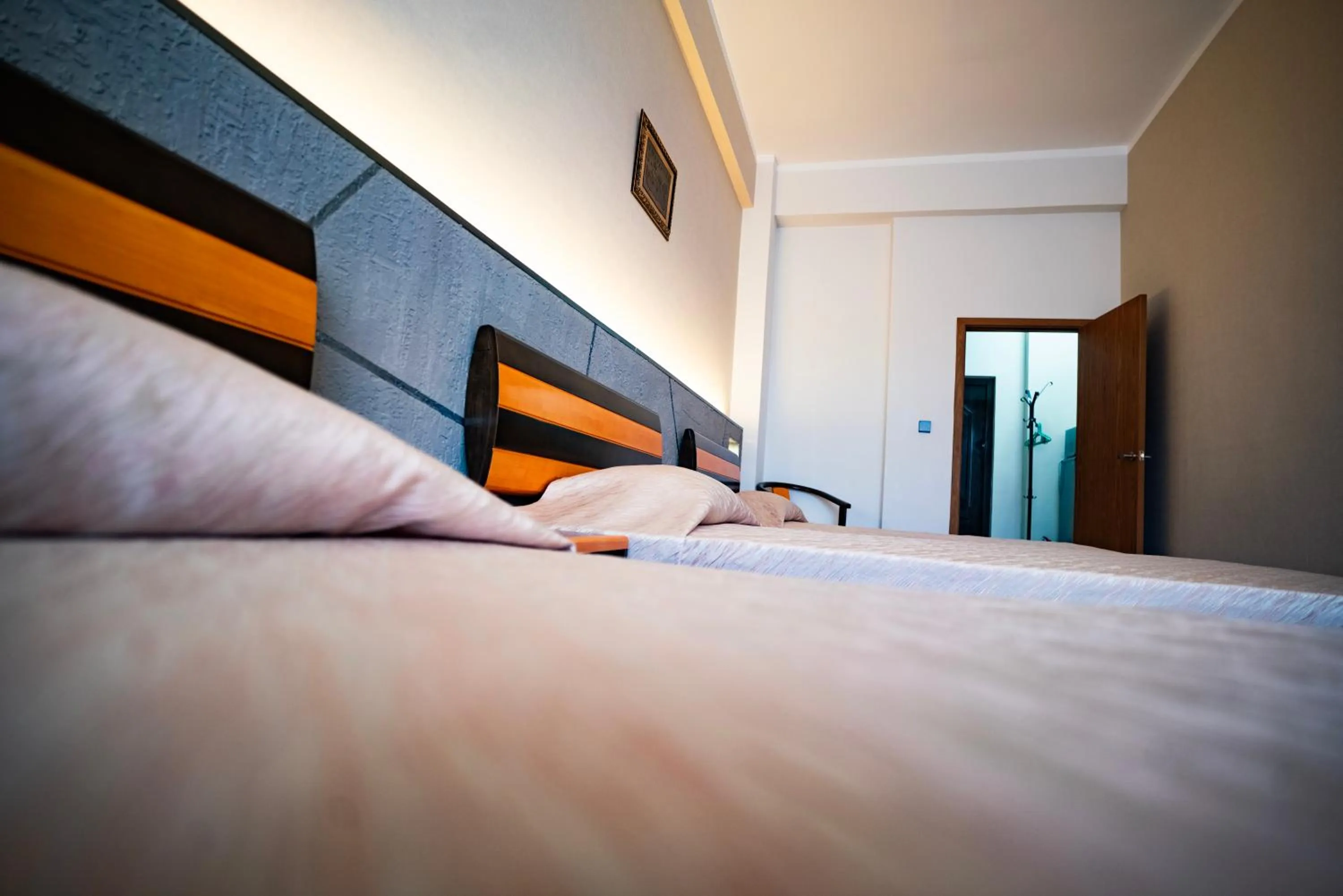 Bed in Tsolmon's Serviced Apartments