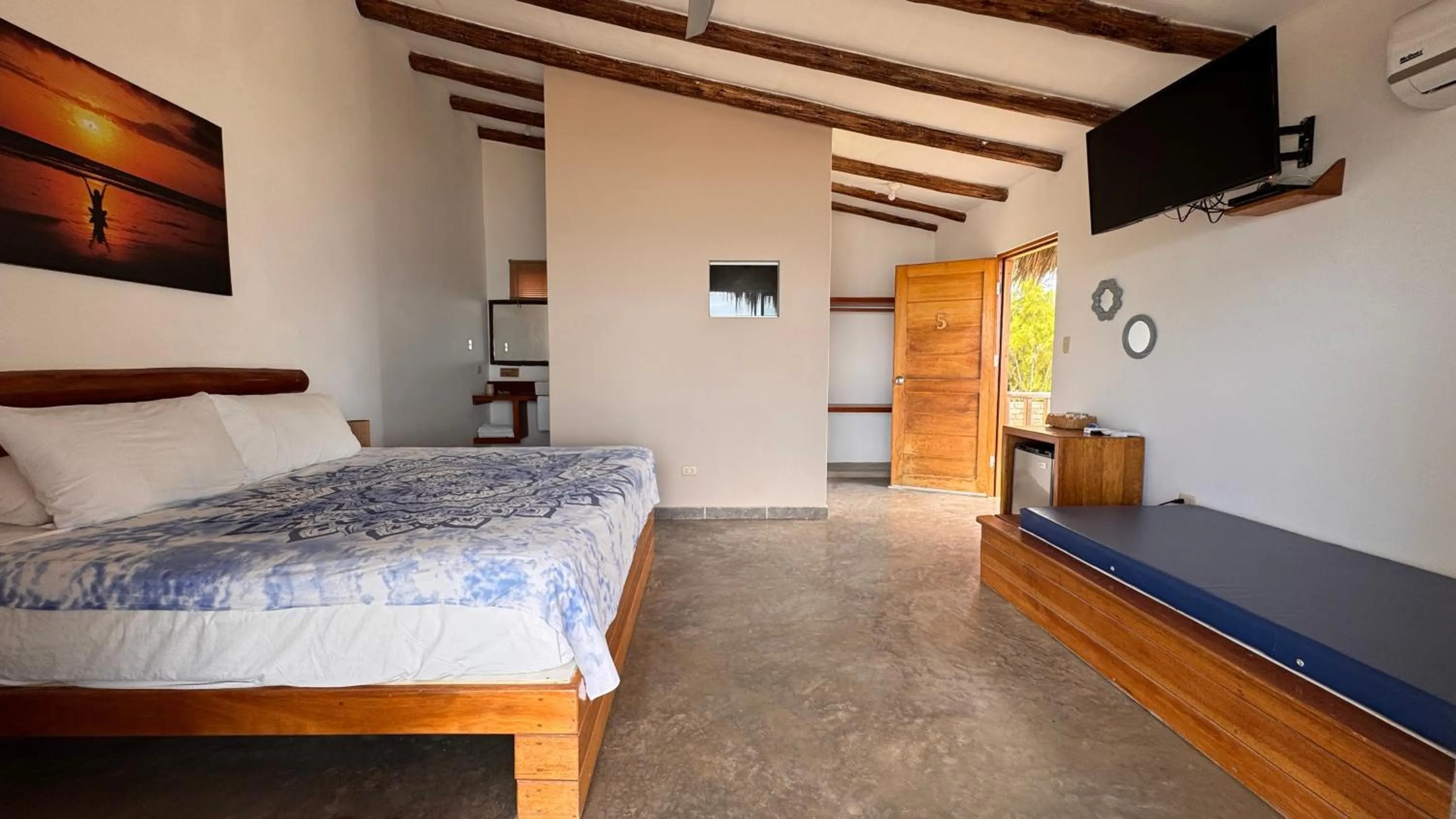 Bed in Baja Canoas Hotel