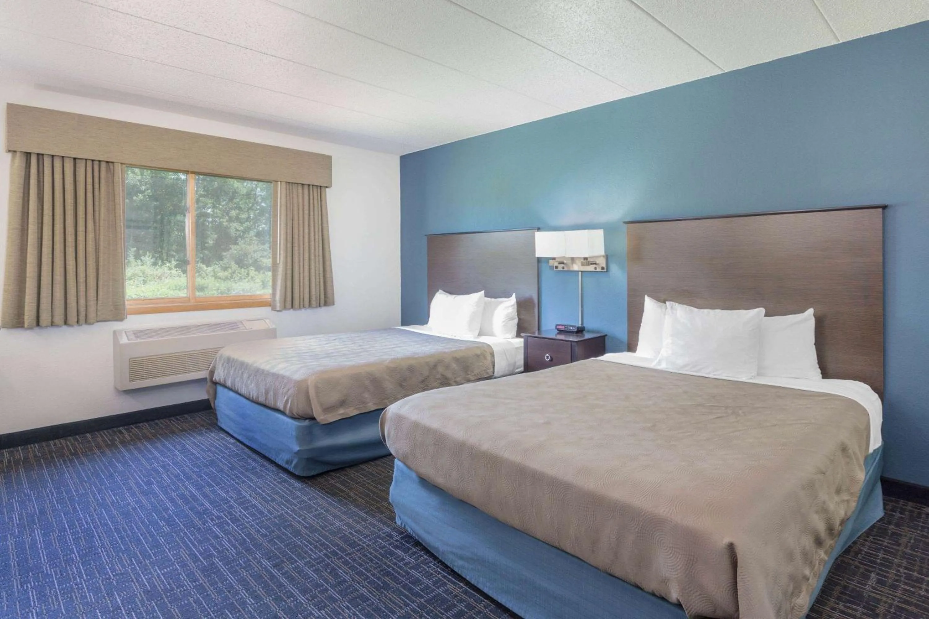 Photo of the whole room, Bed in AmericInn by Wyndham Hayward