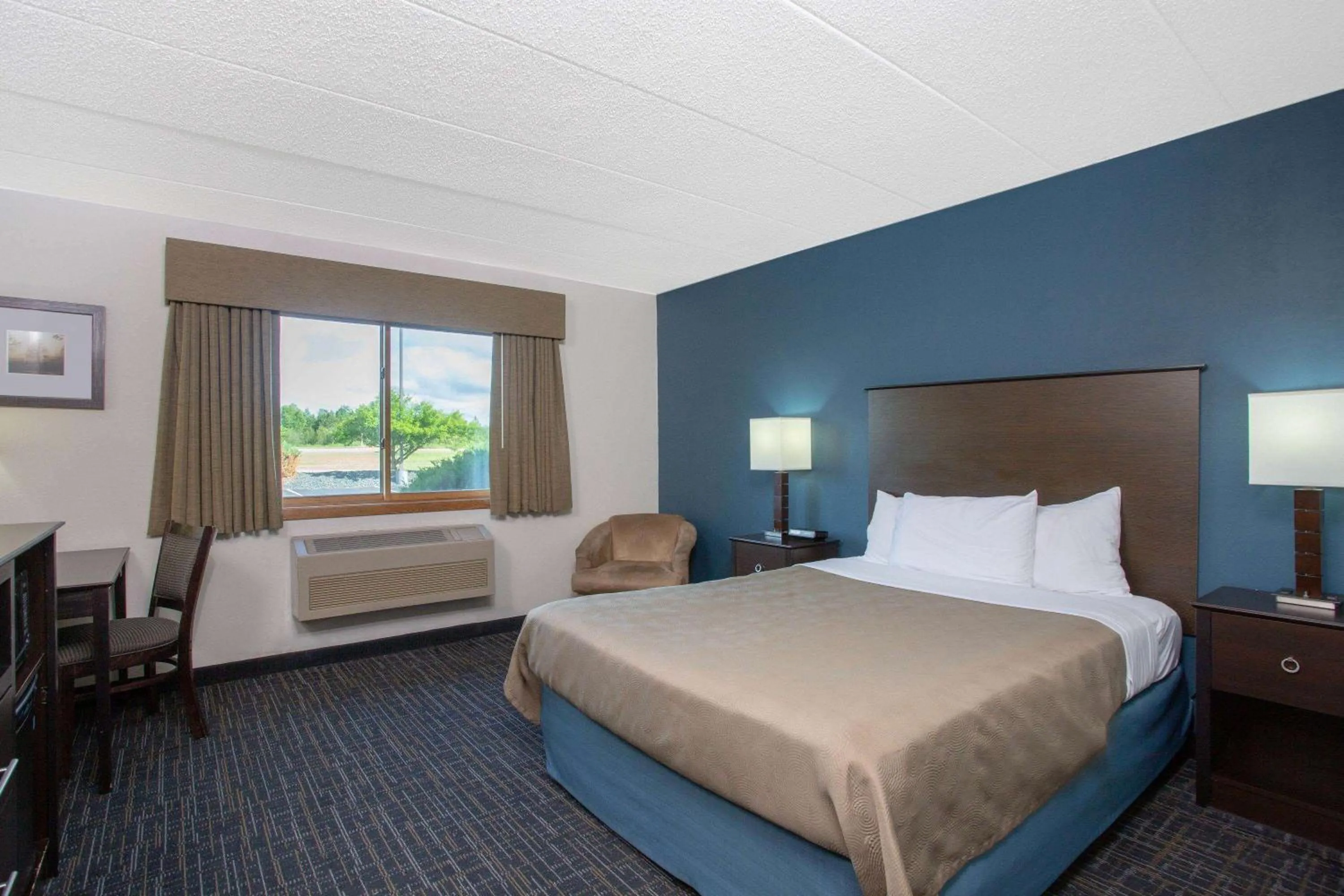 Photo of the whole room, Bed in AmericInn by Wyndham Hayward