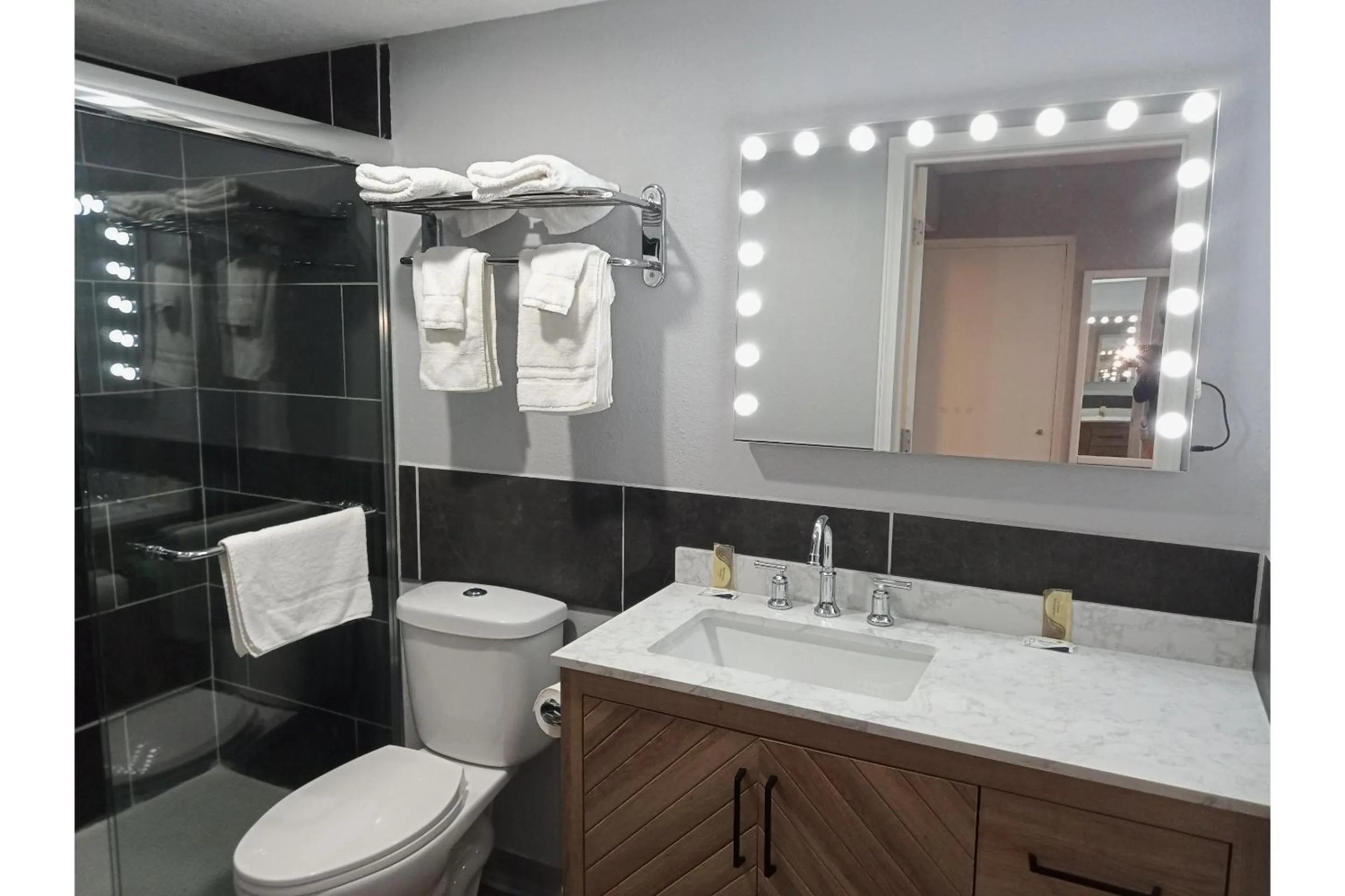 Bathroom in Marshall Lodge By OYO Hwy 65