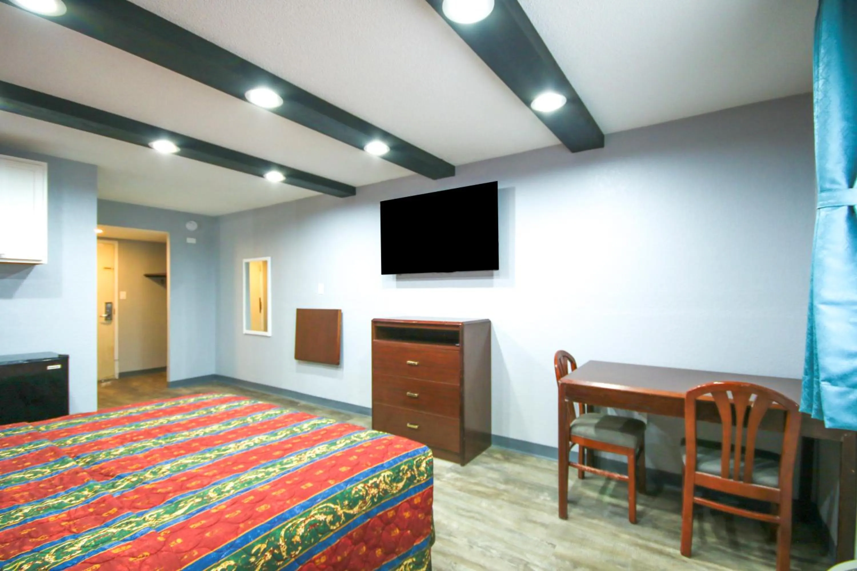 Bedroom, Bed in Marshall Lodge By OYO Hwy 65