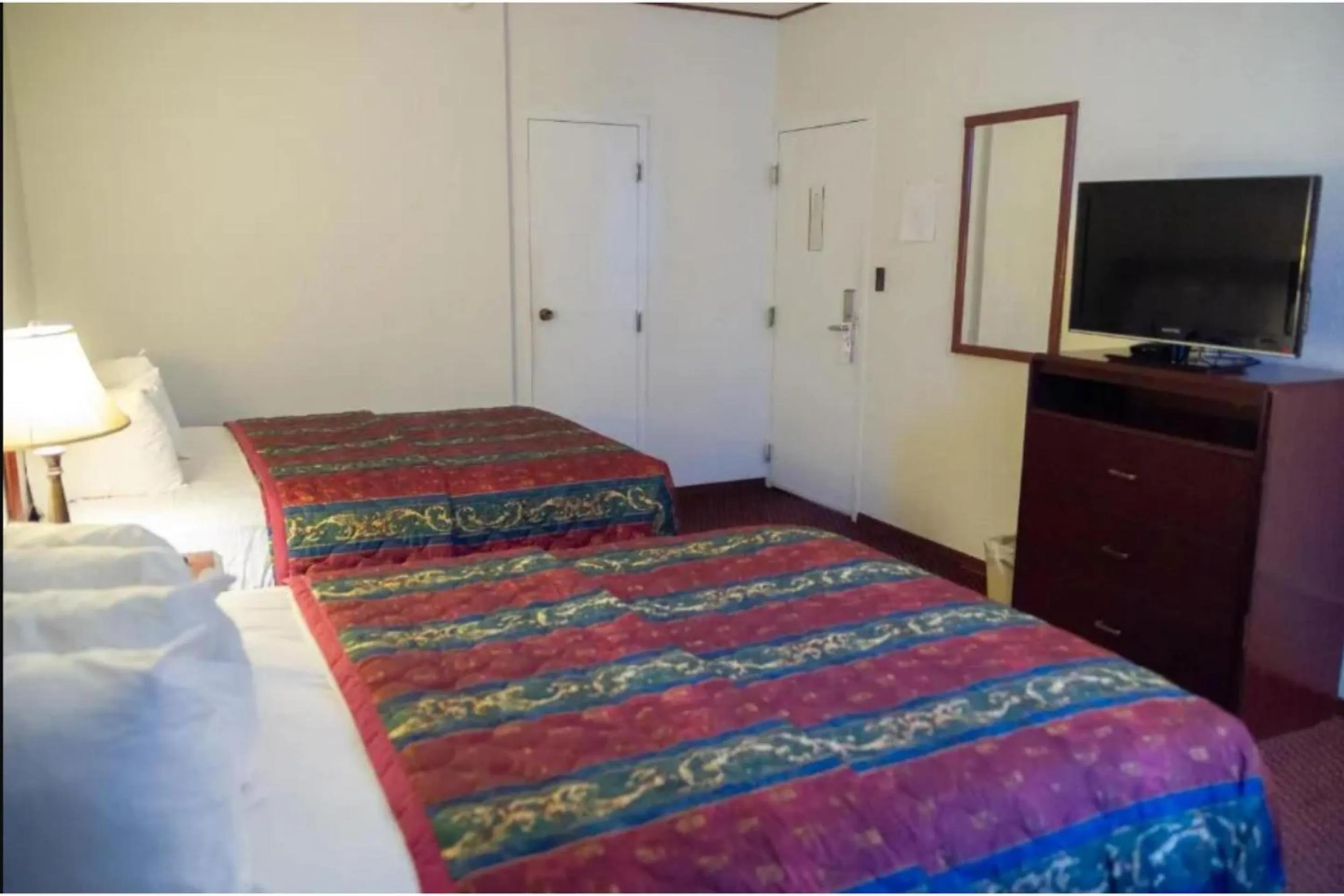 Bedroom, Bed in Marshall Lodge By OYO Hwy 65