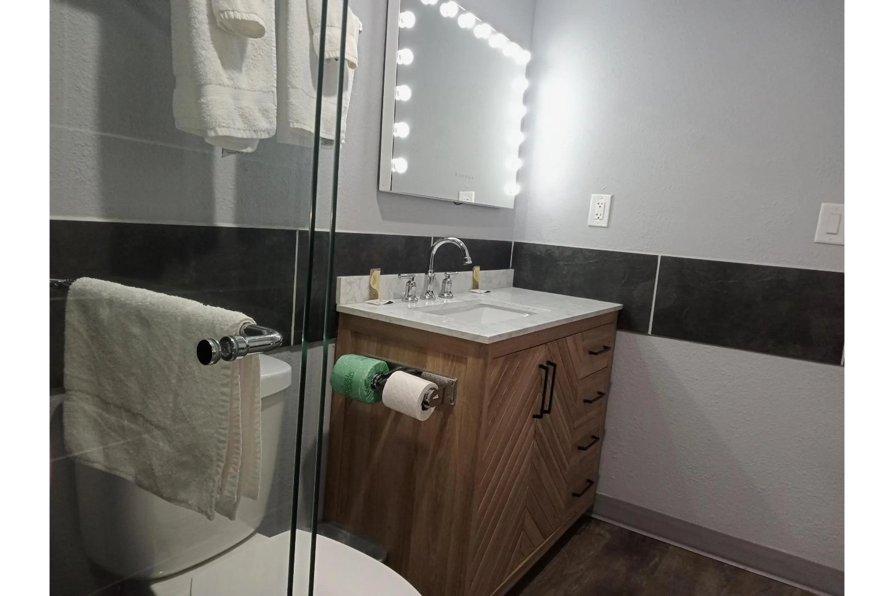 Bathroom in Marshall Lodge By OYO Hwy 65