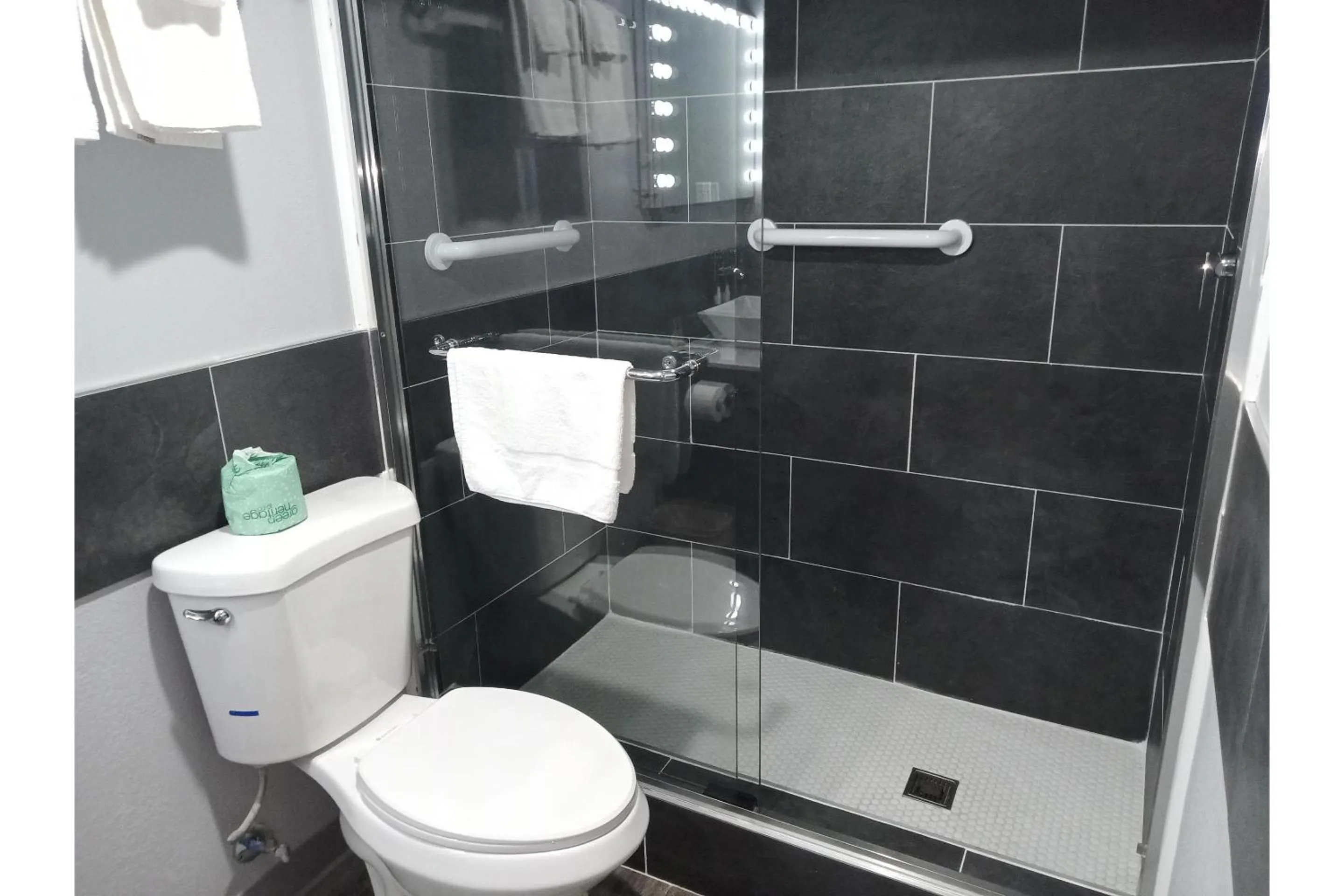 Bathroom in Marshall Lodge By OYO Hwy 65