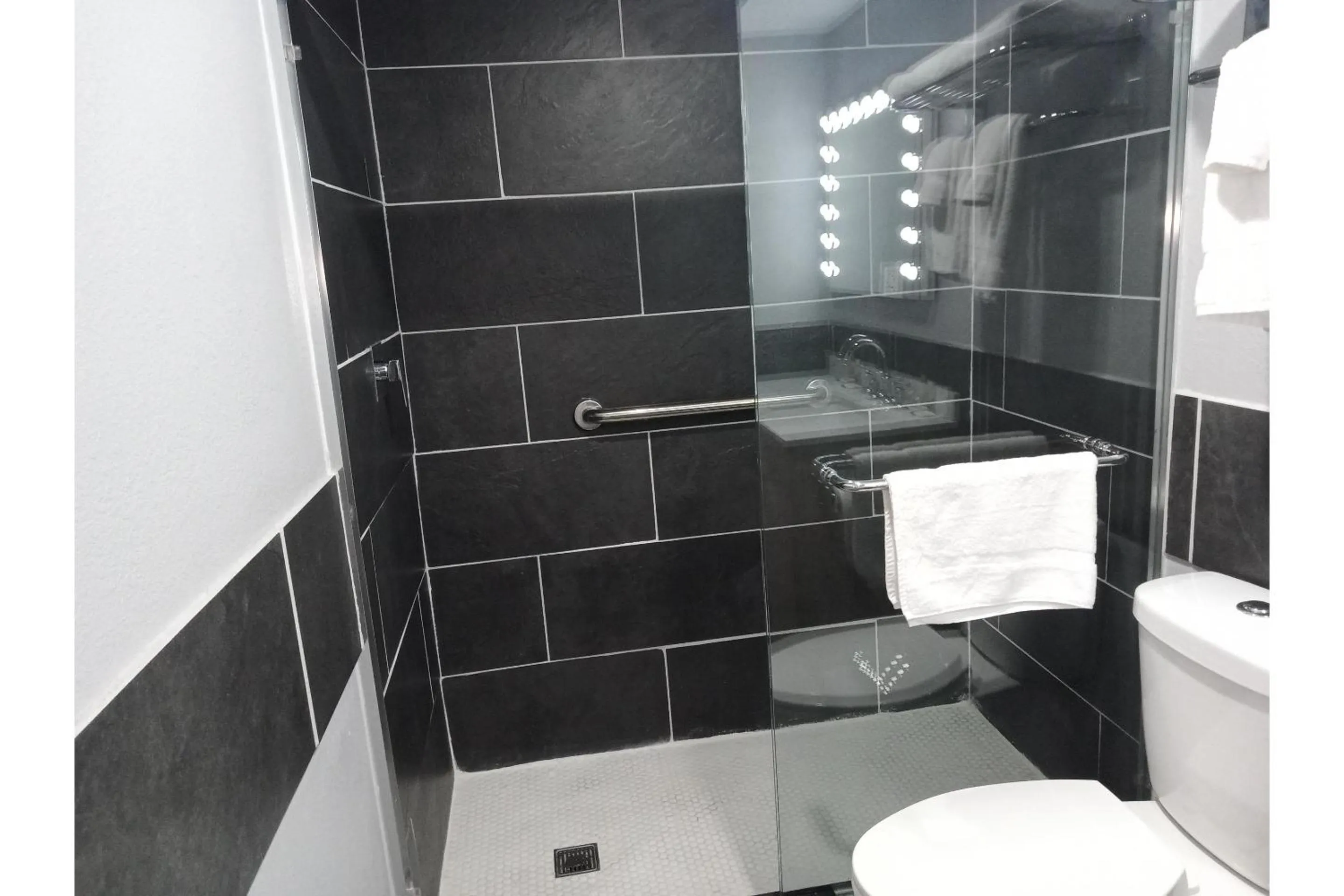 Bathroom in Marshall Lodge By OYO Hwy 65