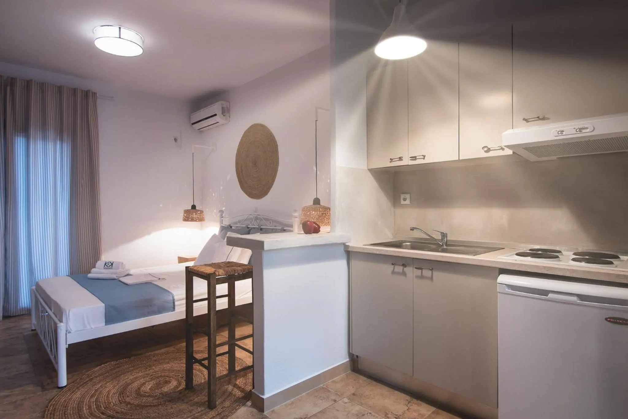 Kitchen or kitchenette in Kallisti Studios & Apartments