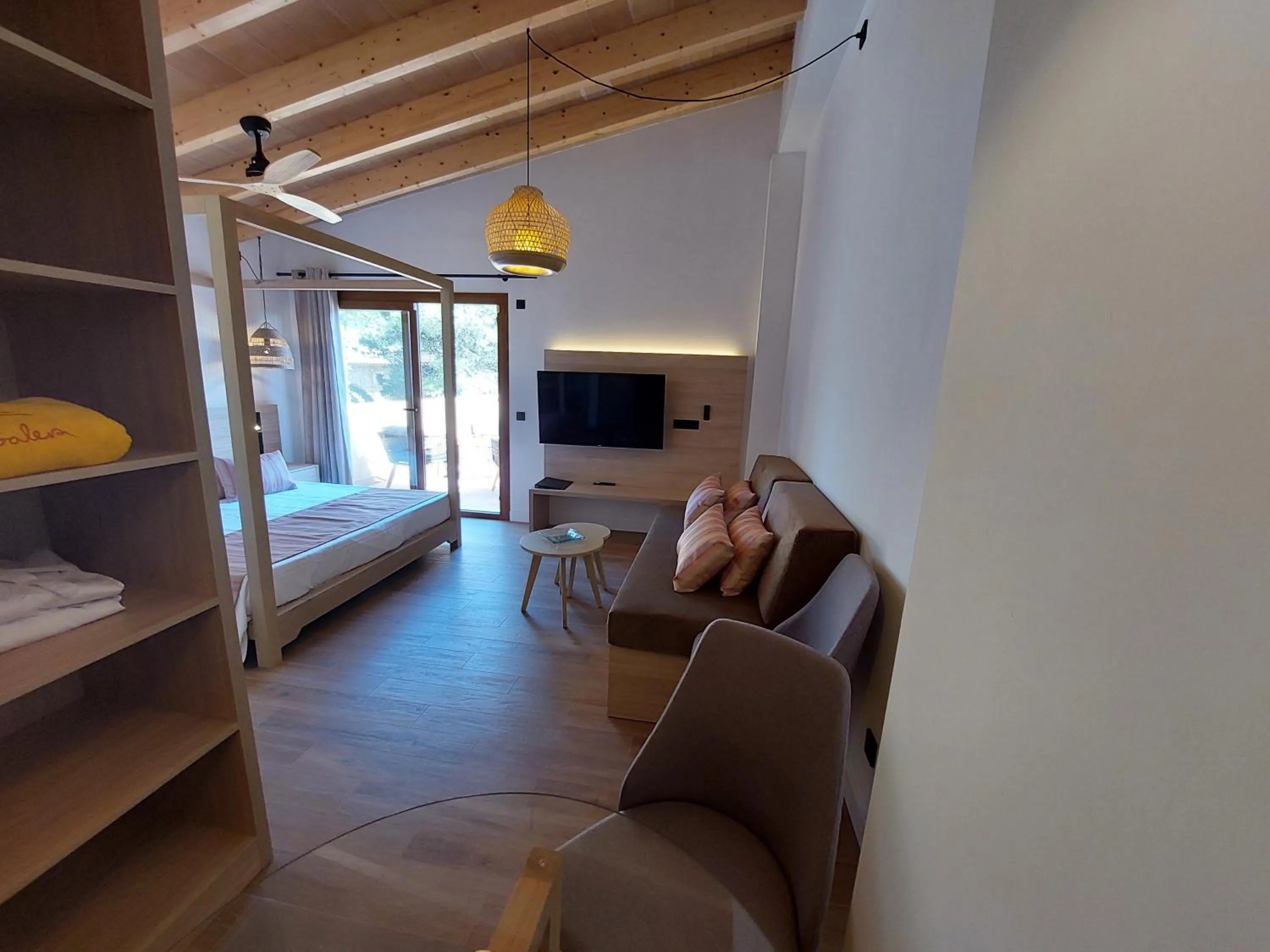 Living room, Bed in Boutique Hotel Sa Galera