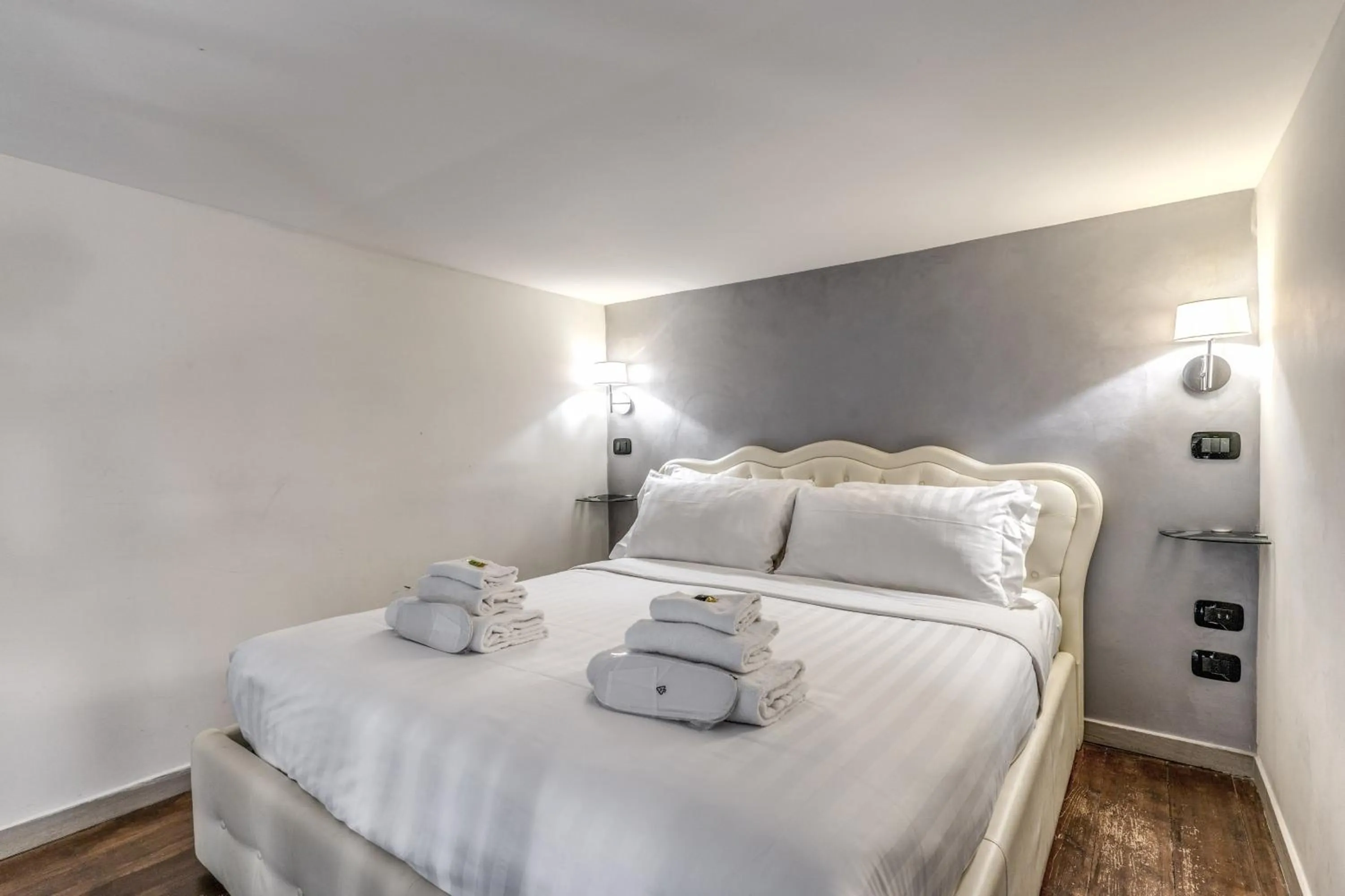 Bed in Operà Suites Pinciana