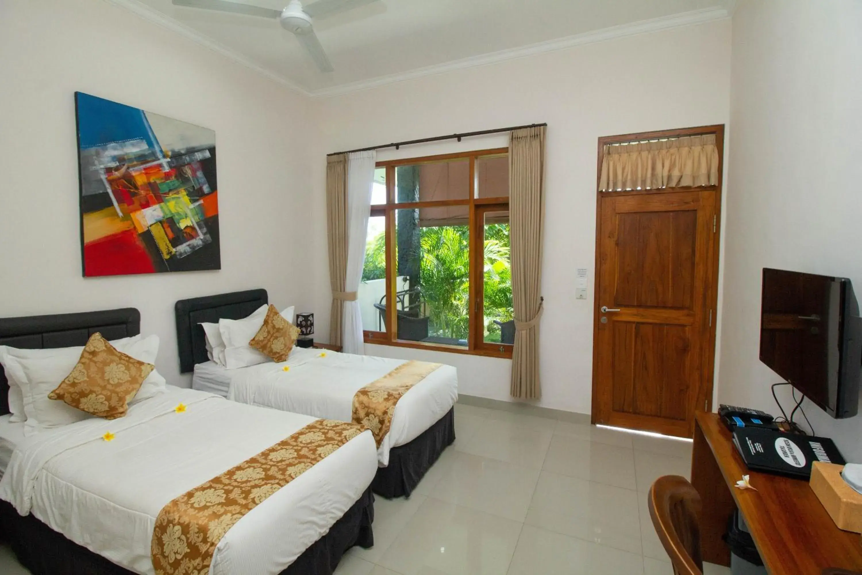 Deluxe Twin Room with Balcony and Garden View in Ocean Villa Dive Resort - Tulamben Deluxe Twin Room with Balcony and Garden View in Ocean Villa Dive Resort - Tulamben