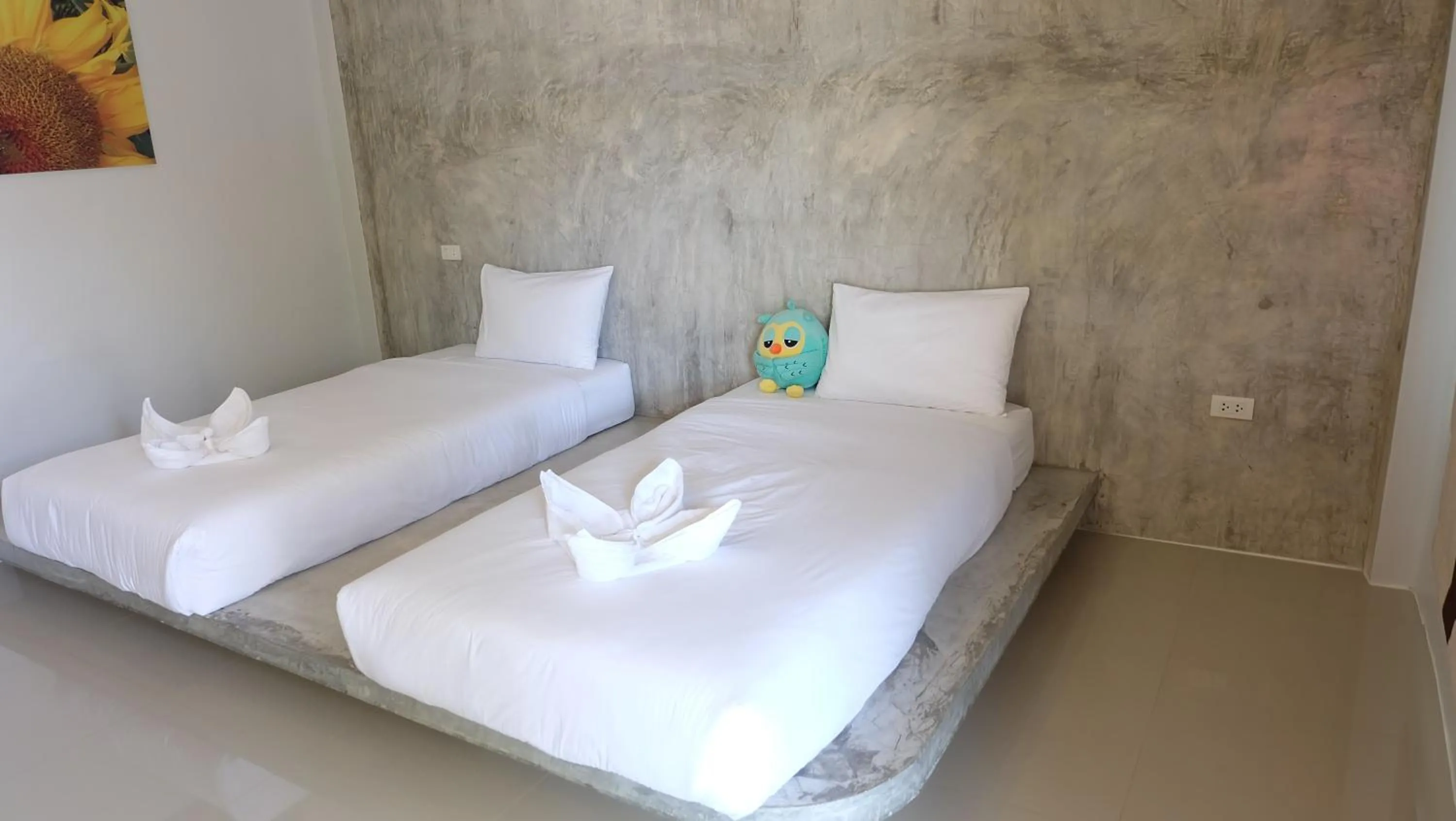 Bed in Lullaby Boutique Resort