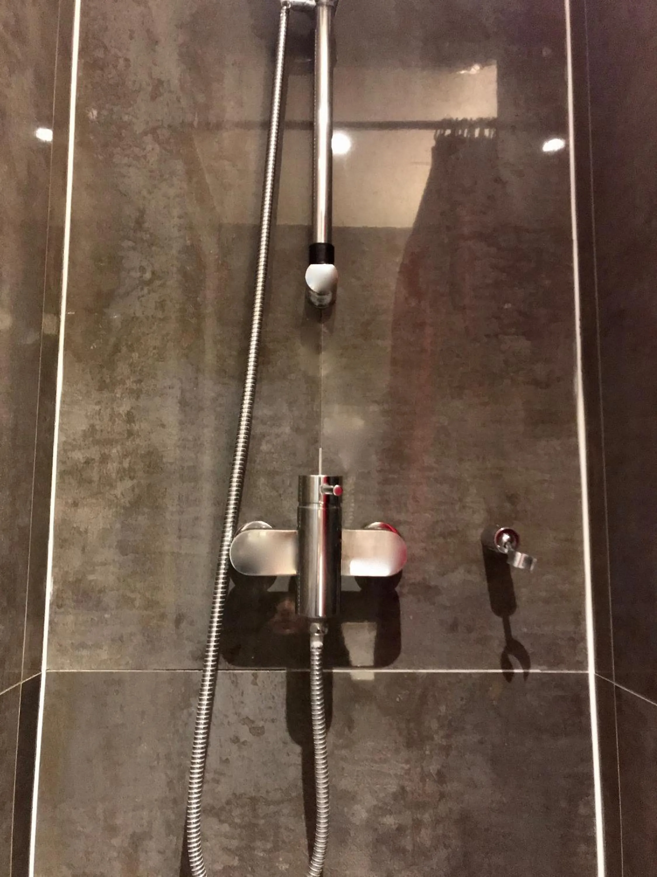 Shower in Plug inn Montmartre by Hiphophostels