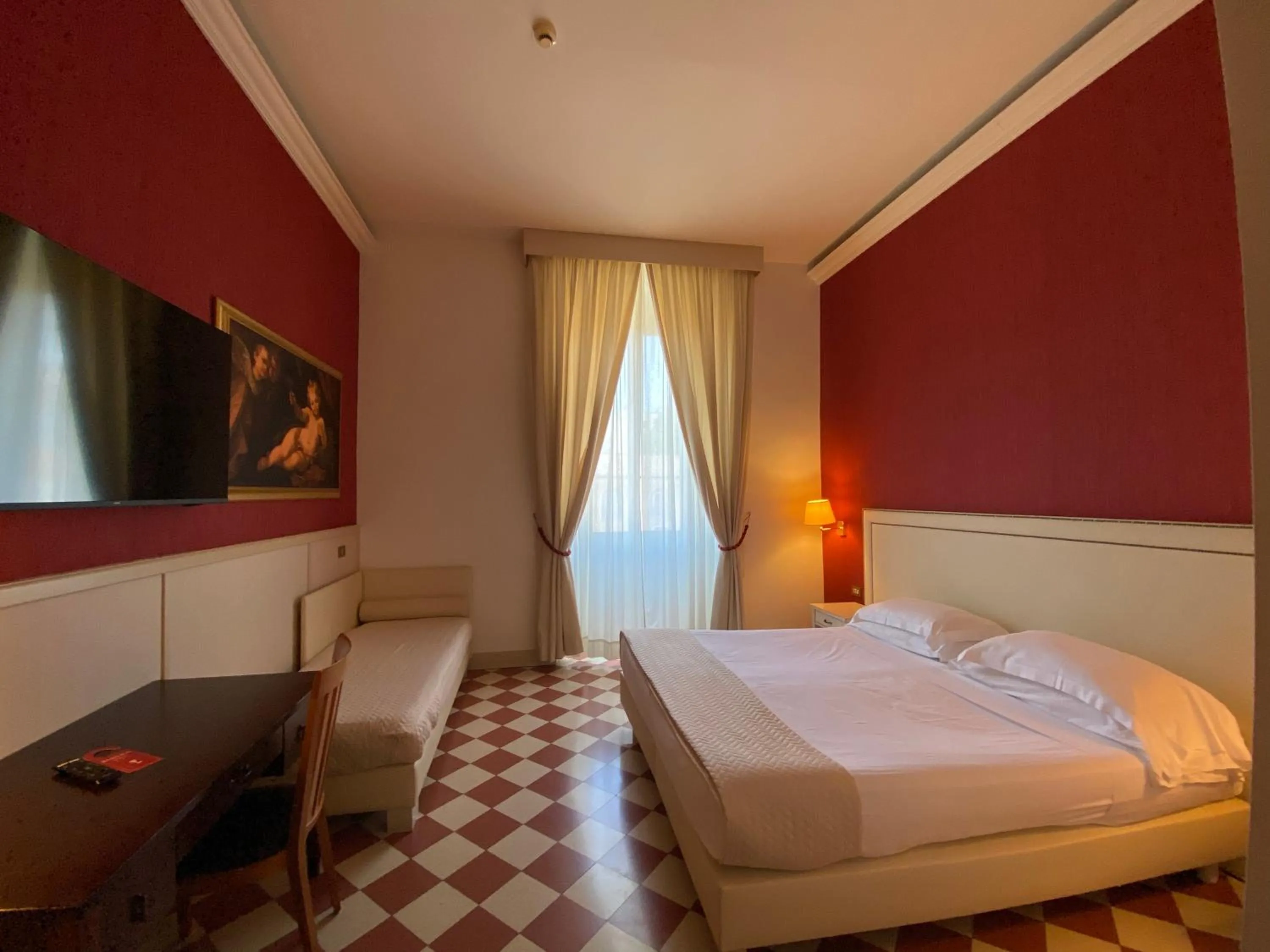 Bed in Basilica Hotel