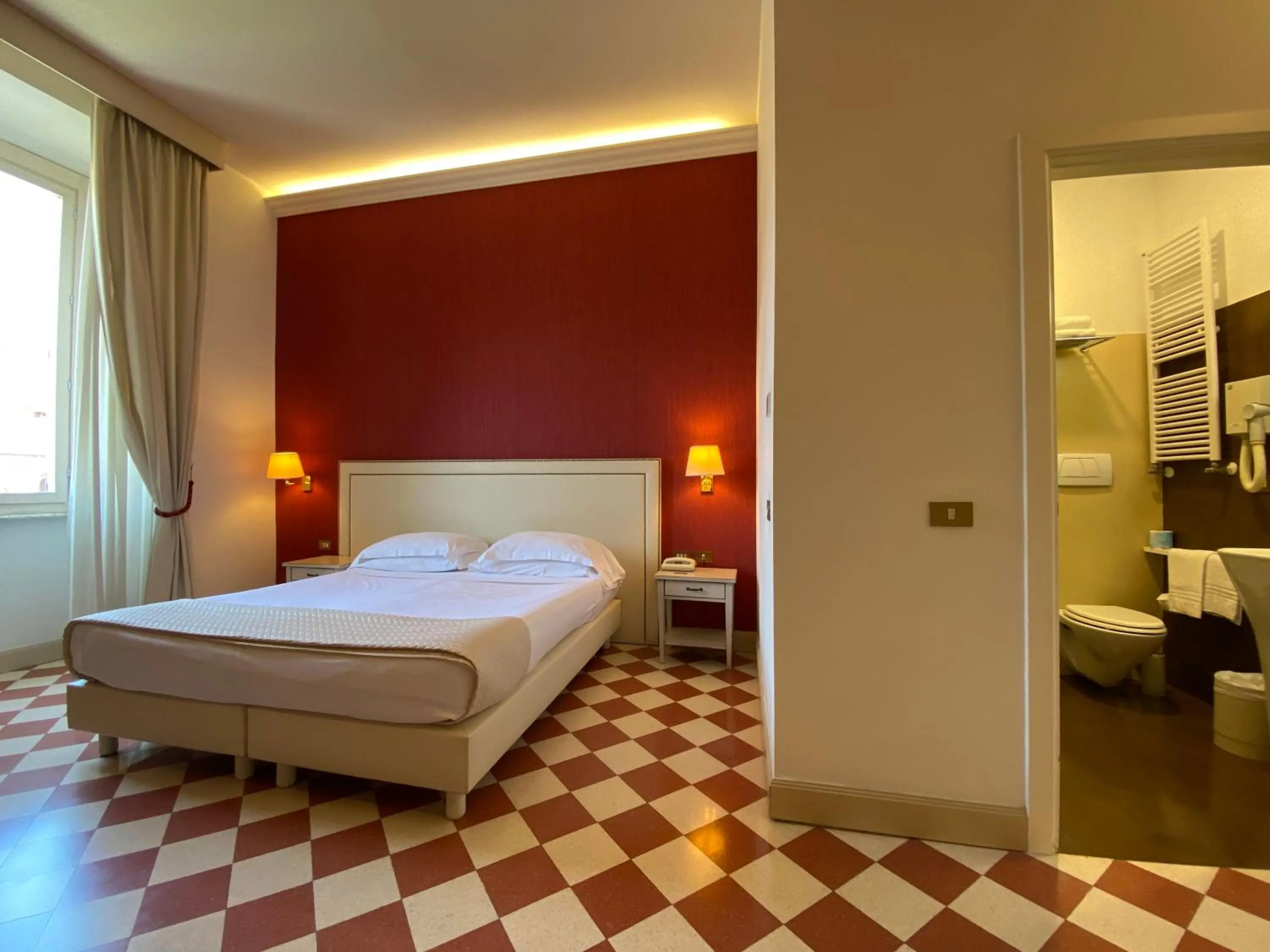 Bed in Basilica Hotel