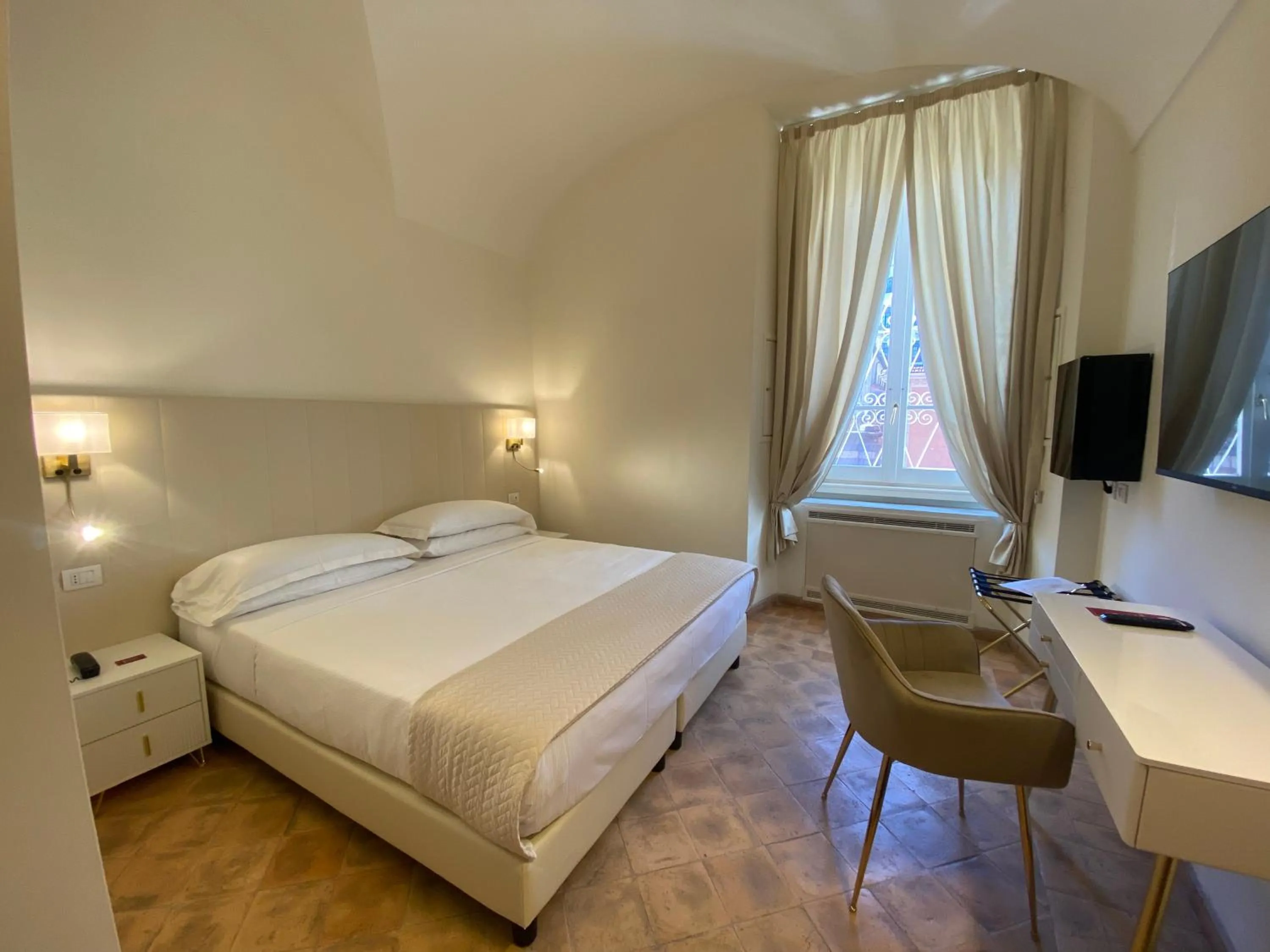 Bed in Basilica Hotel