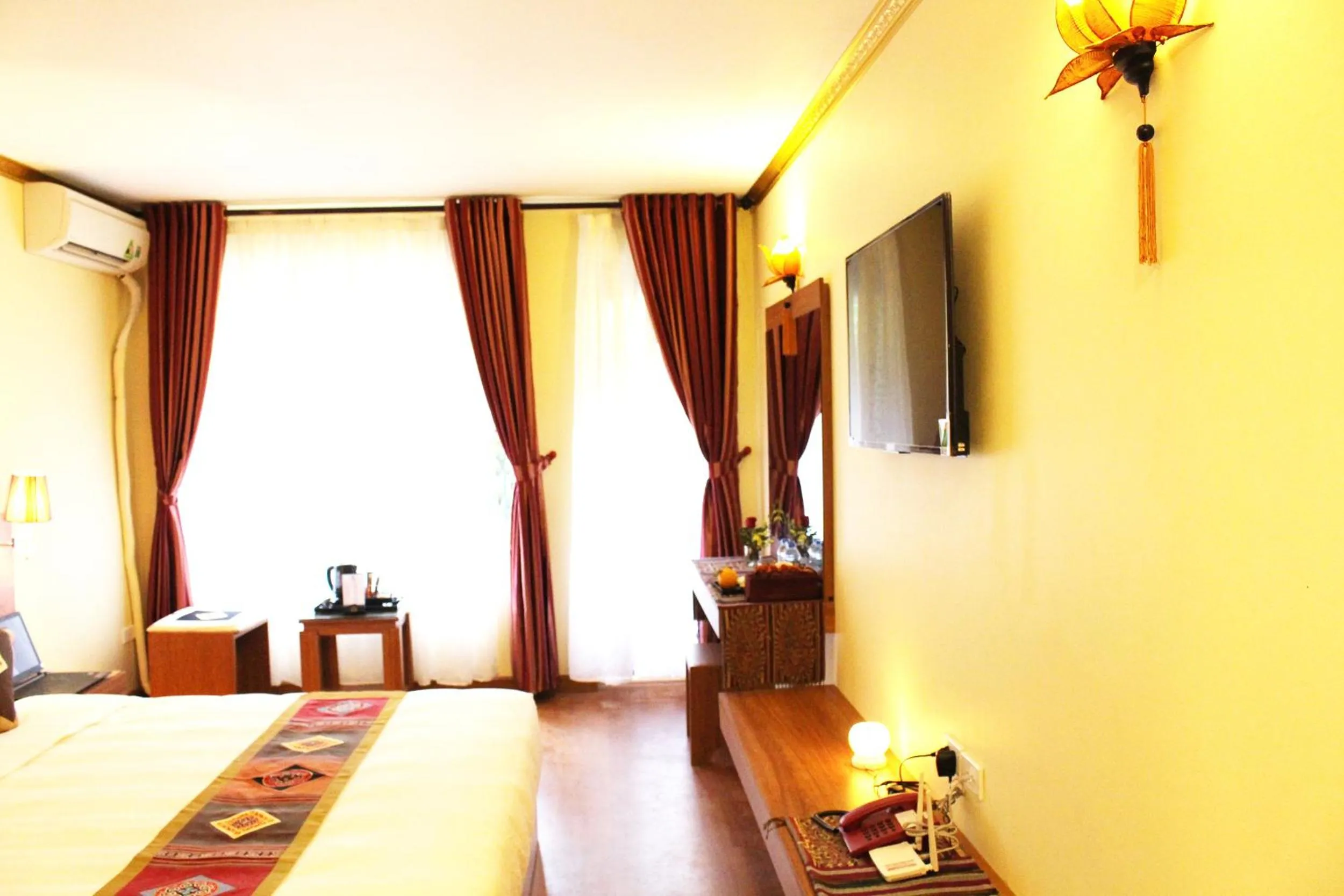Photo of the whole room, Bed in Sapa Dragon Hotel