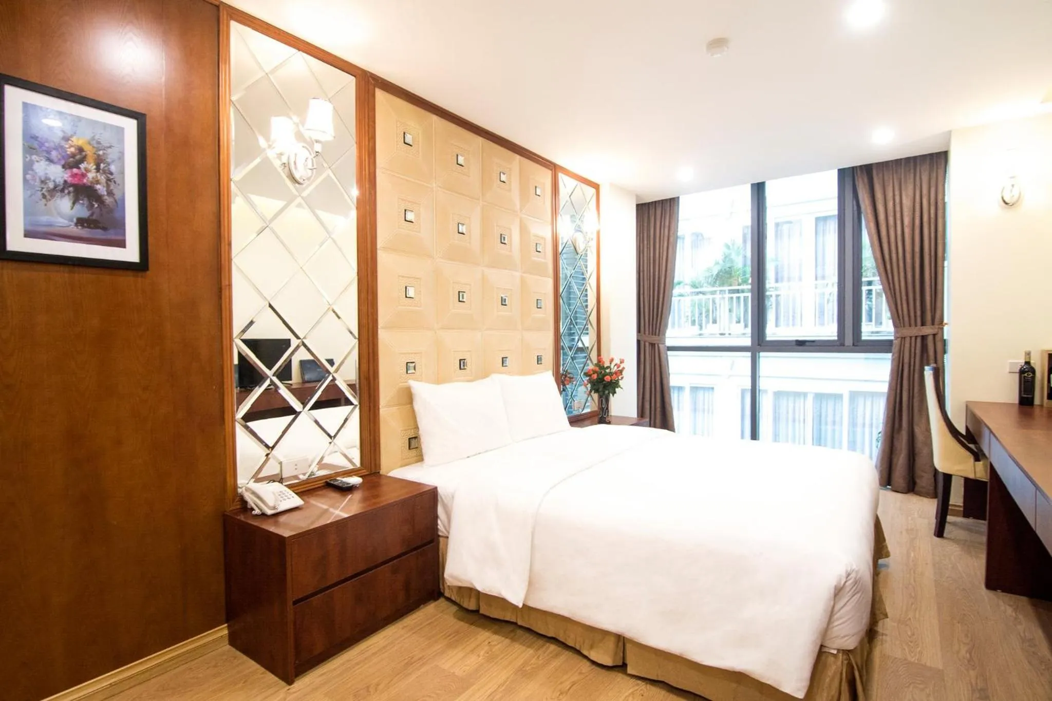 Bed in Canary Ha Noi Hotel