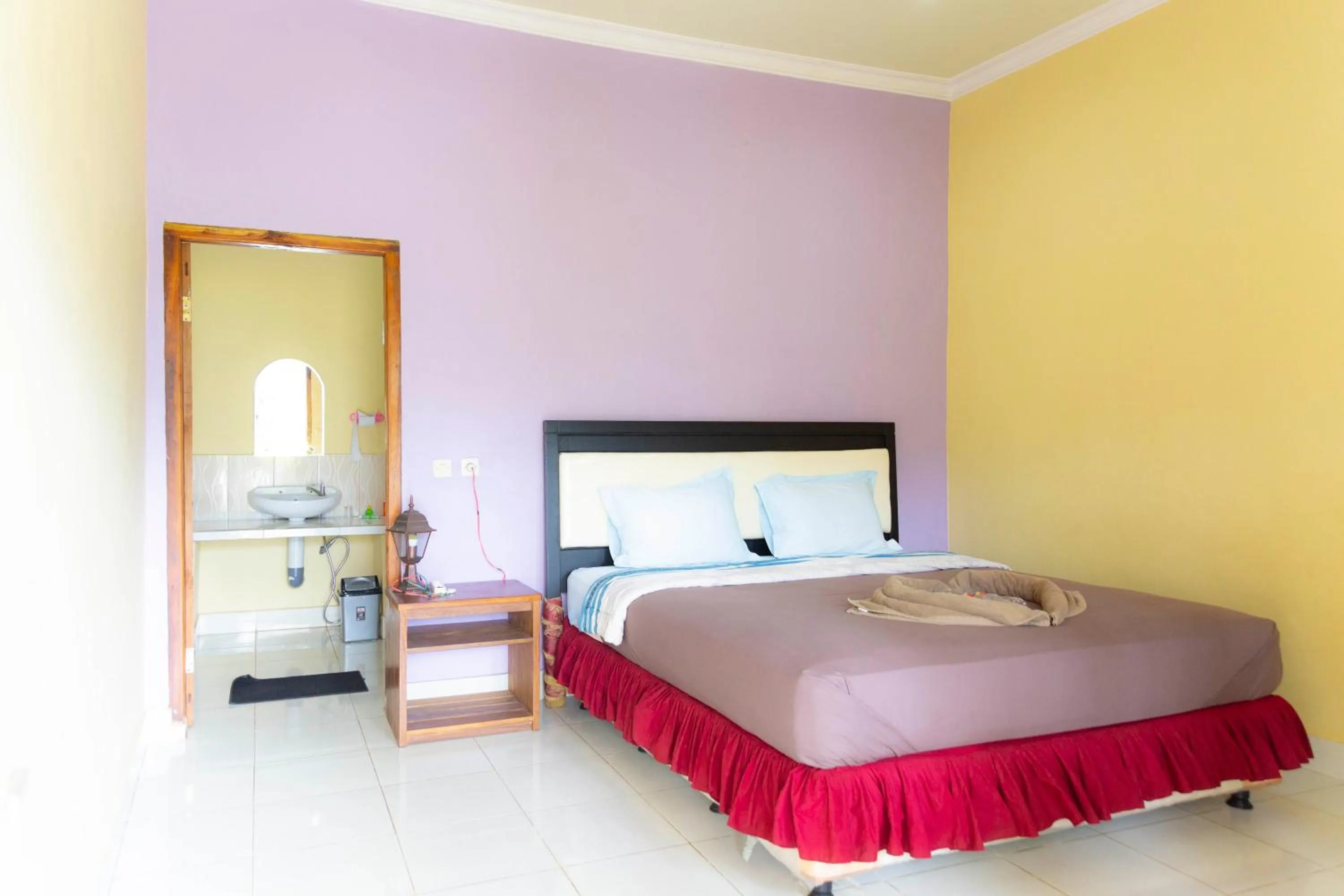 Bed in Pondok Guru Bakti Cottage