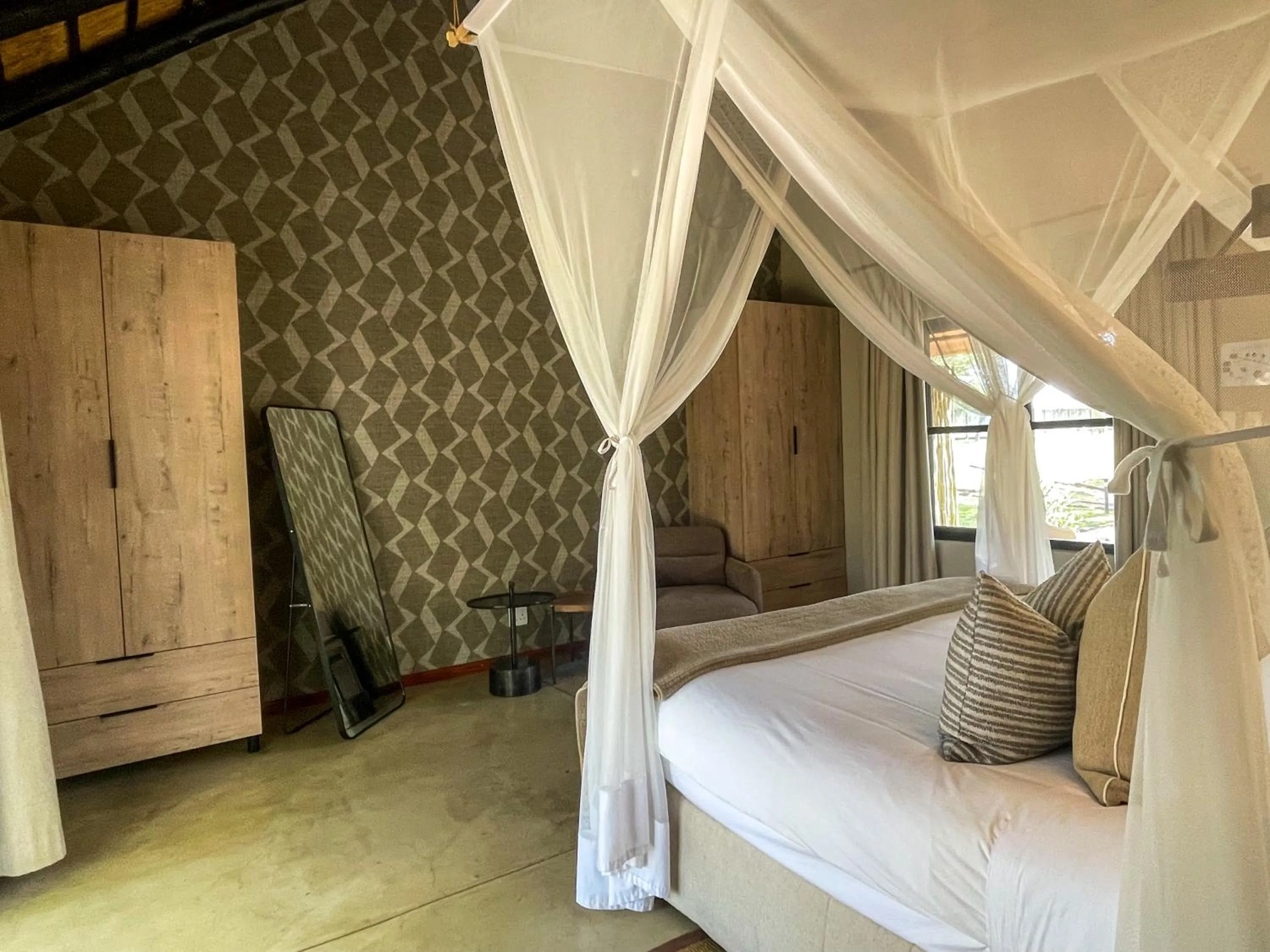 Bed in Xanatseni Private Camp