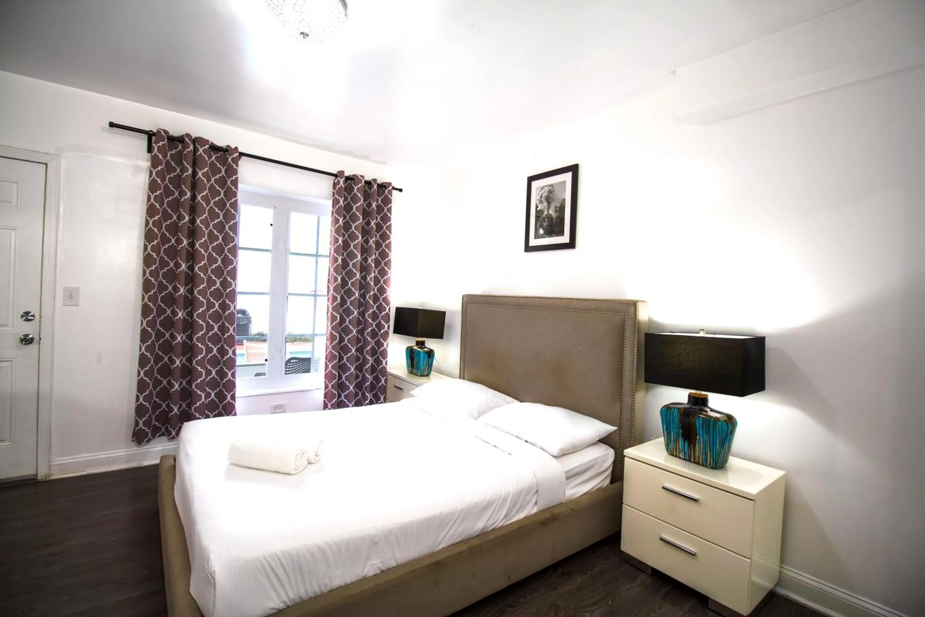 Bed in Courtyard Apartments Part of the Oasis Casita Collection