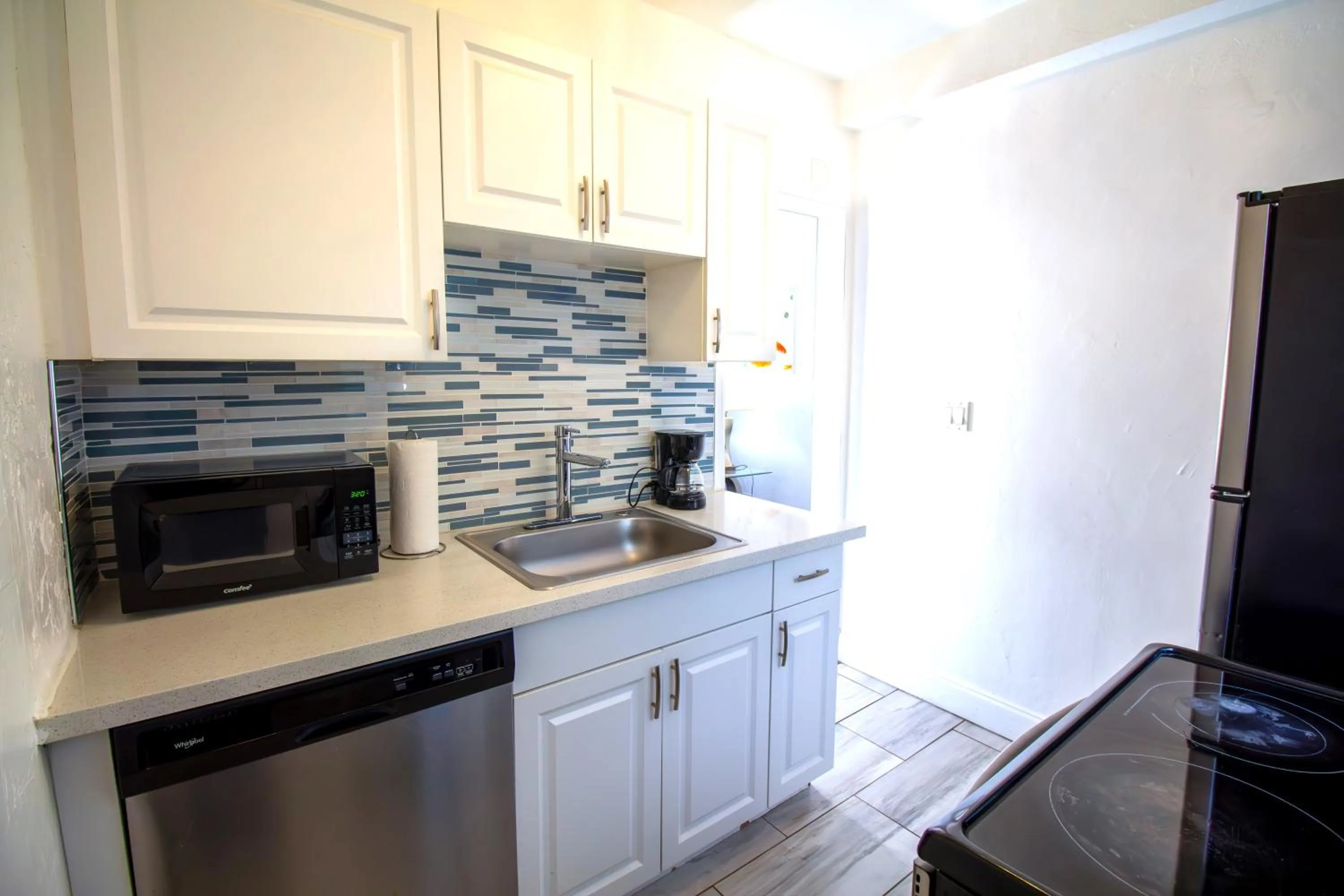 Kitchen or kitchenette in Courtyard Apartments Part of the Oasis Casita Collection