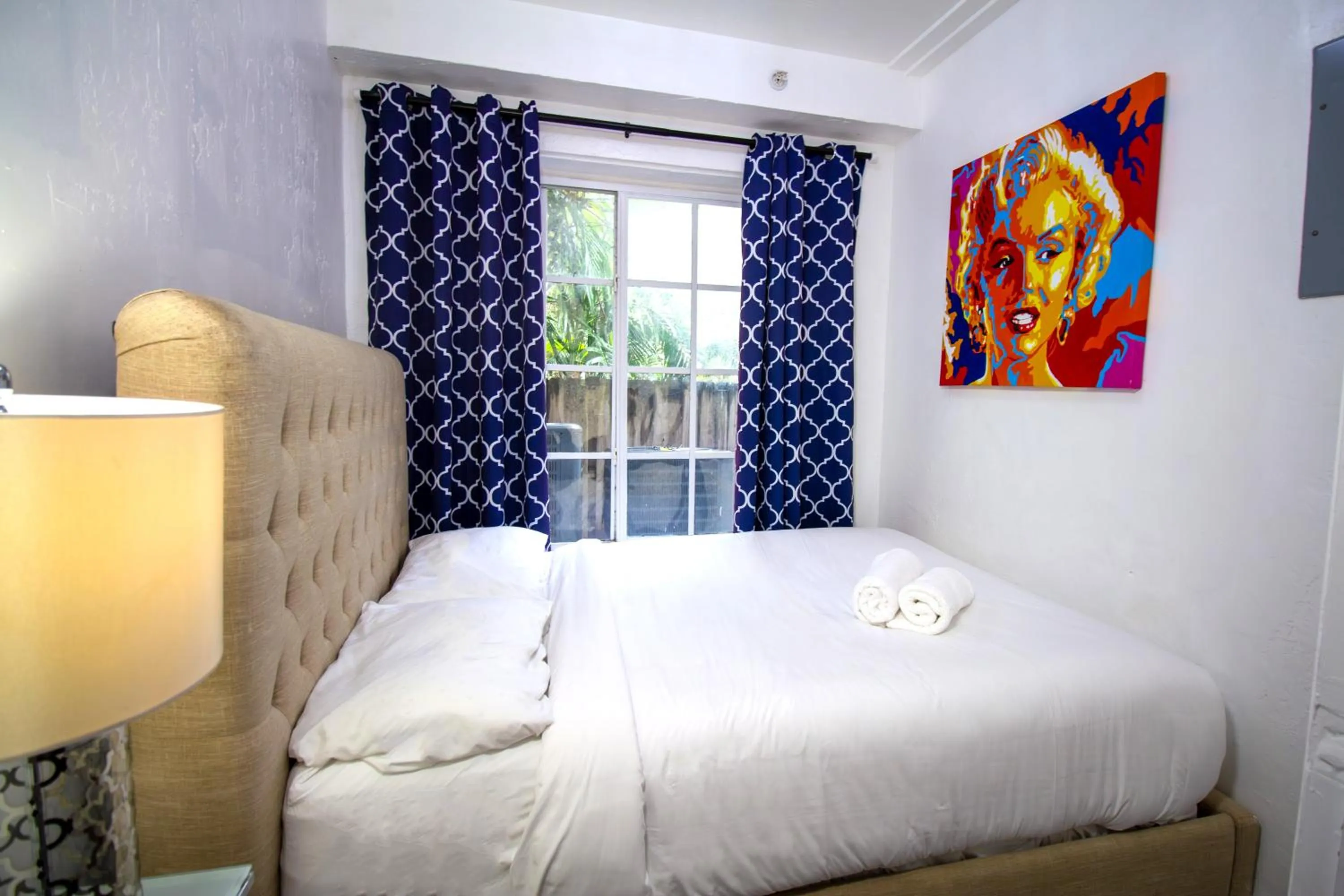 Bed in Courtyard Apartments Part of the Oasis Casita Collection