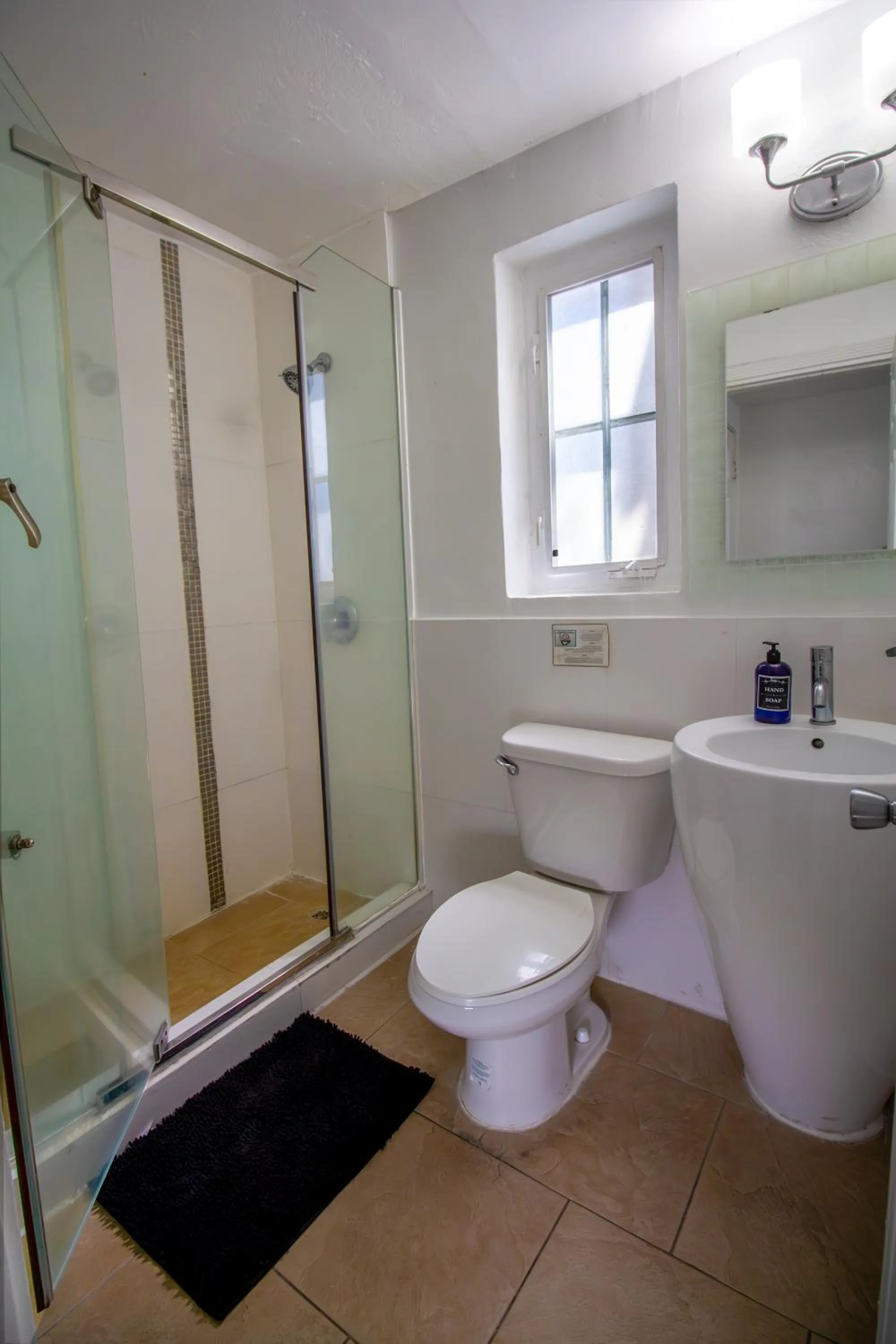 Shower in Courtyard Apartments Part of the Oasis Casita Collection