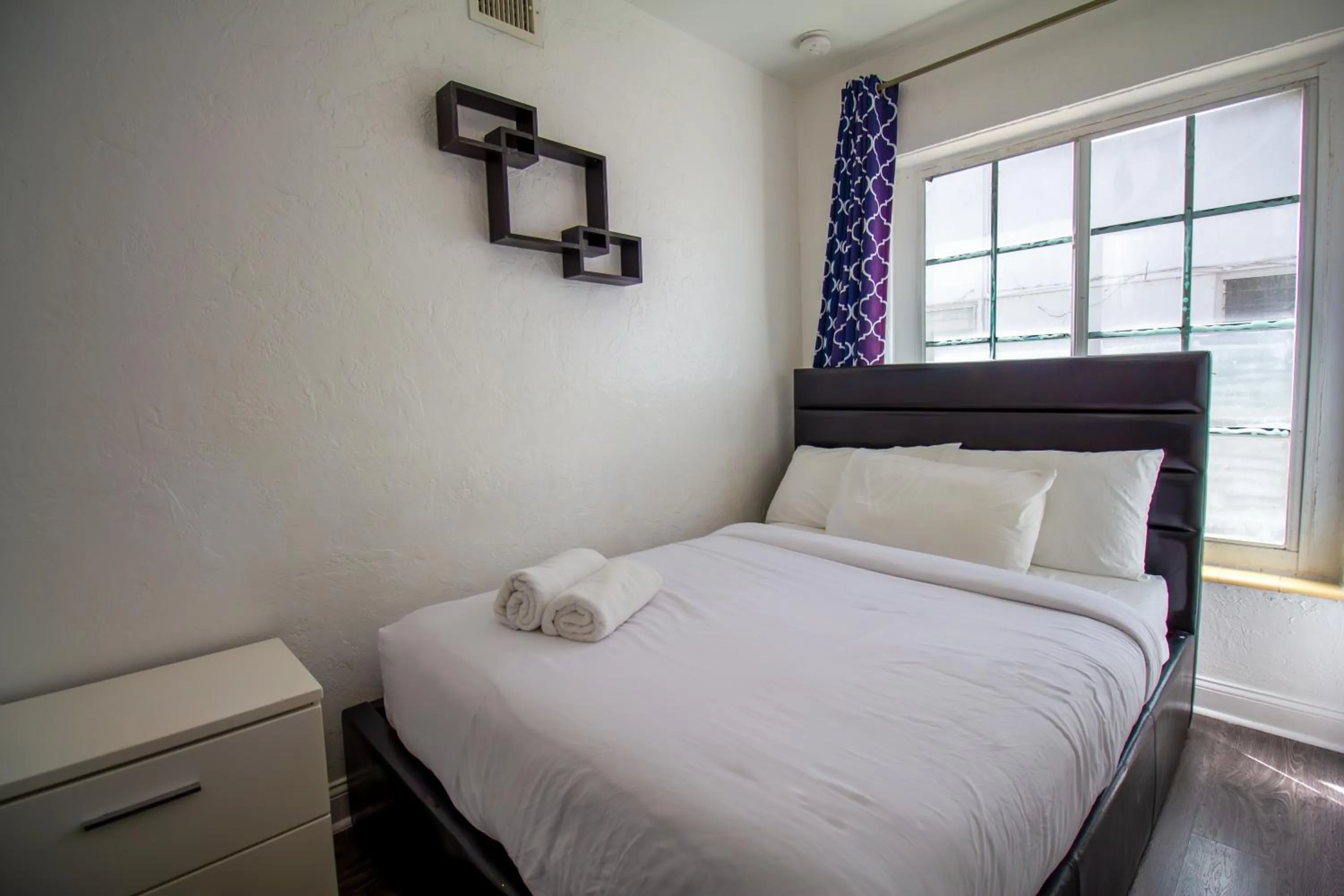 Bed in Courtyard Apartments Part of the Oasis Casita Collection