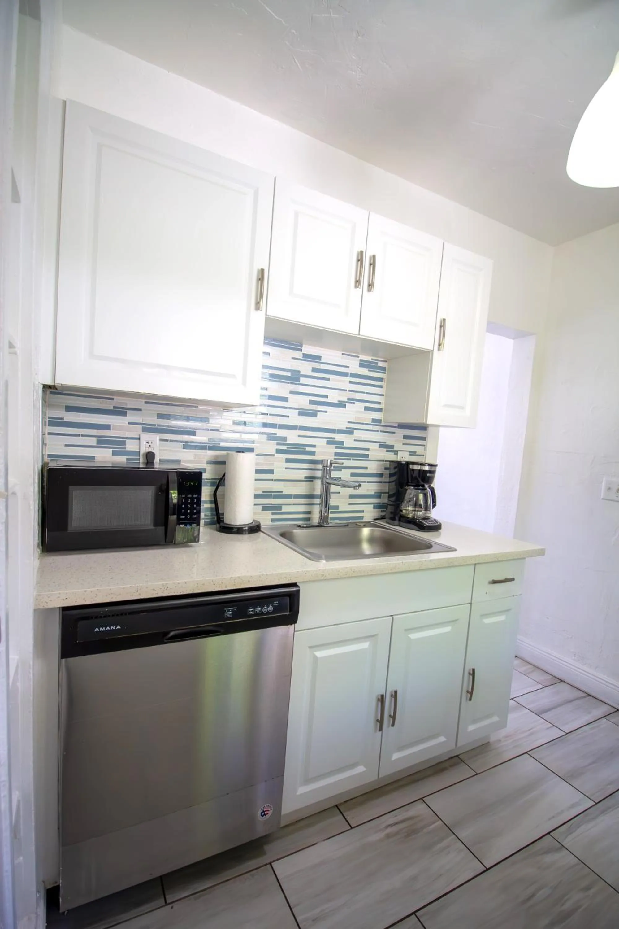 Kitchen or kitchenette in Courtyard Apartments Part of the Oasis Casita Collection