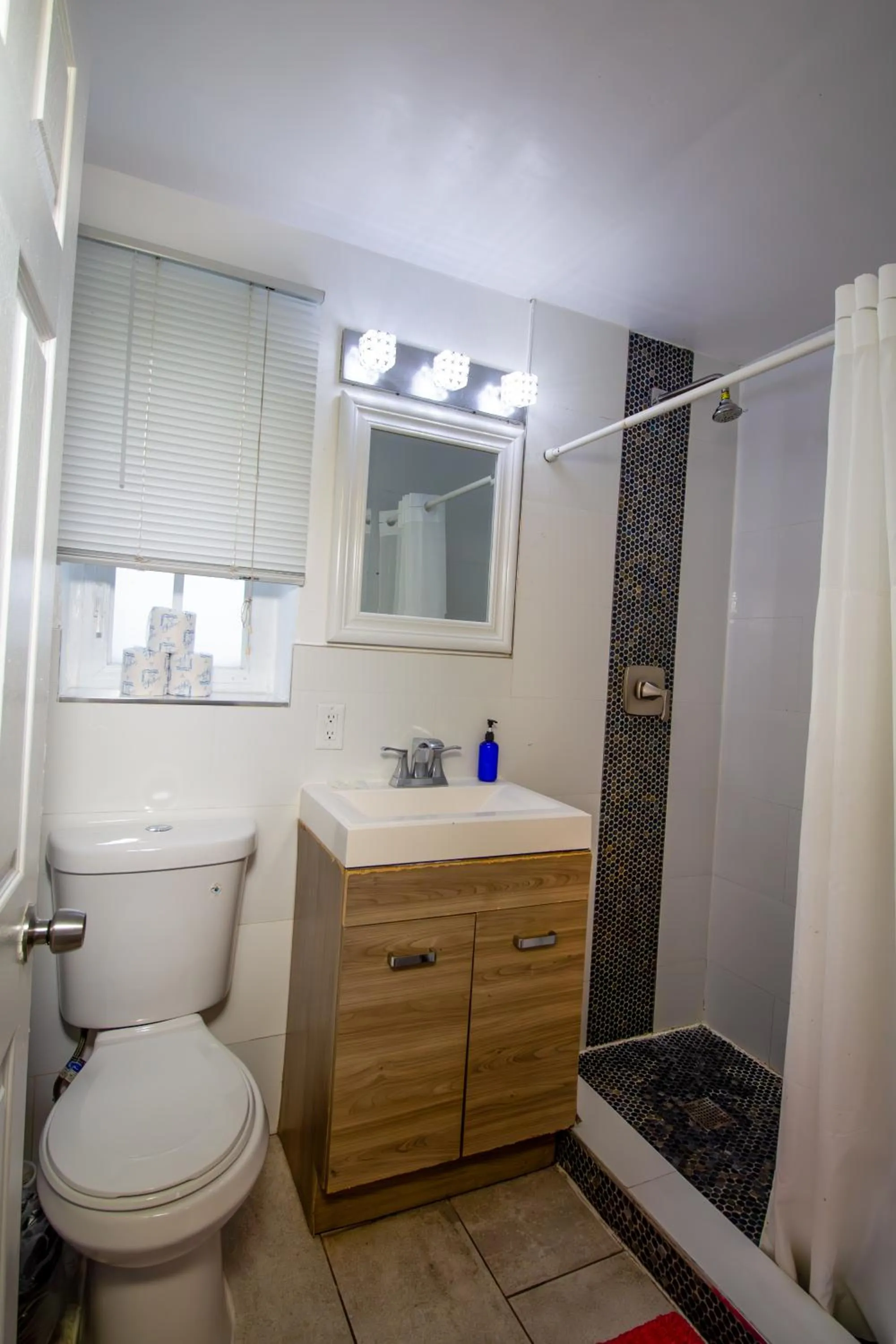 Shower in Courtyard Apartments Part of the Oasis Casita Collection