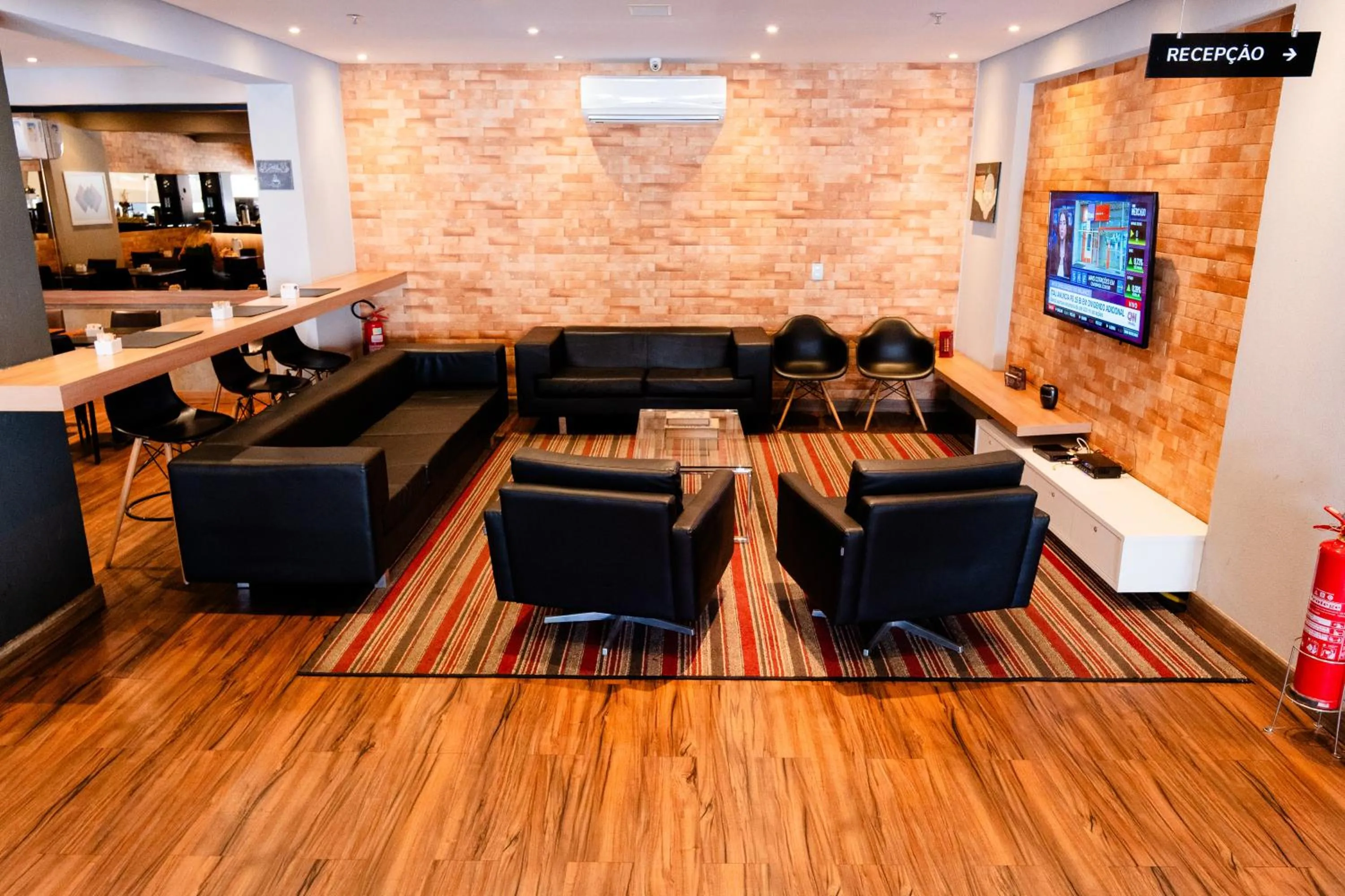 Communal lounge/ TV room in i5 Hotel Águas Claras