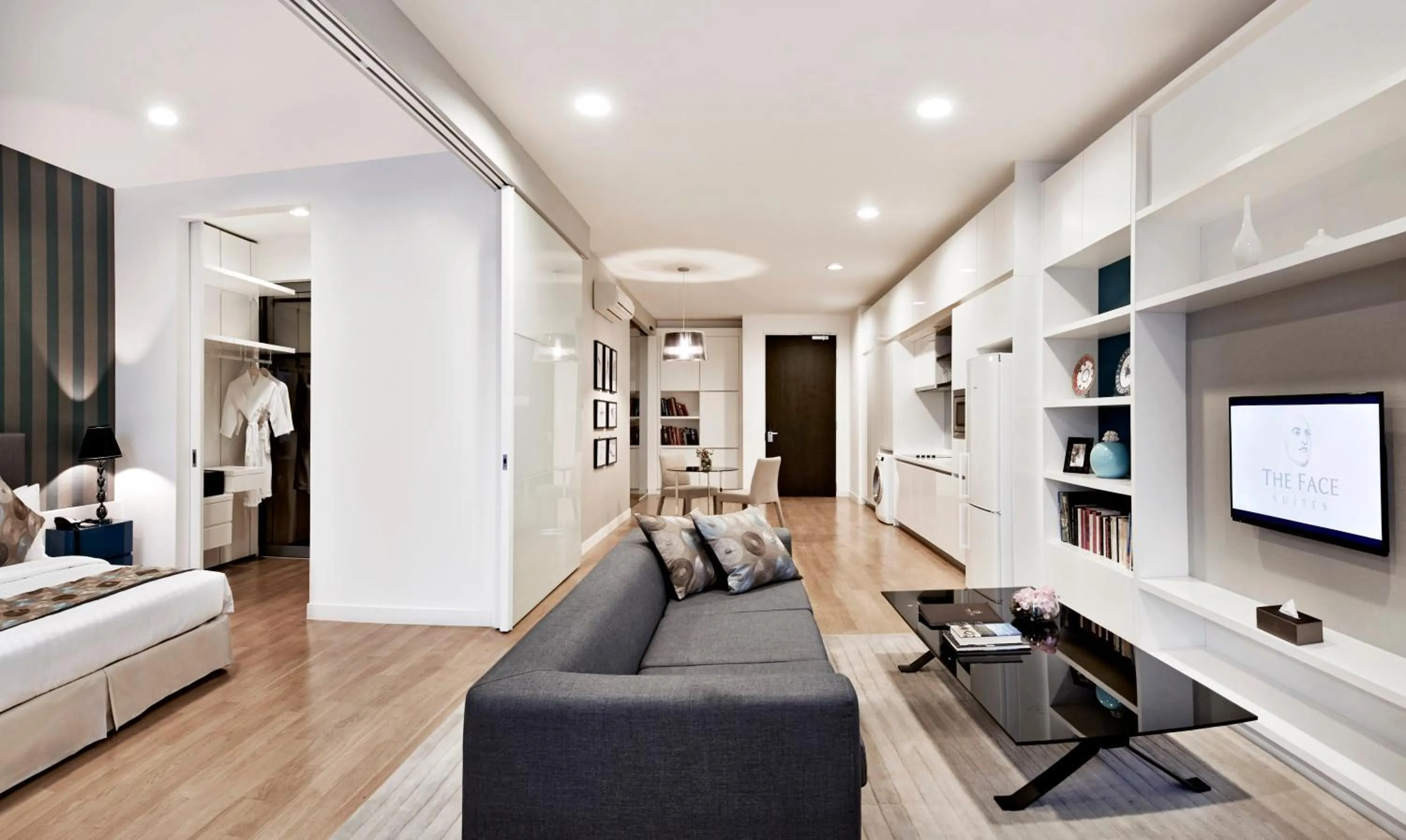 Living room, Bed in THE FACE Suites Hotel