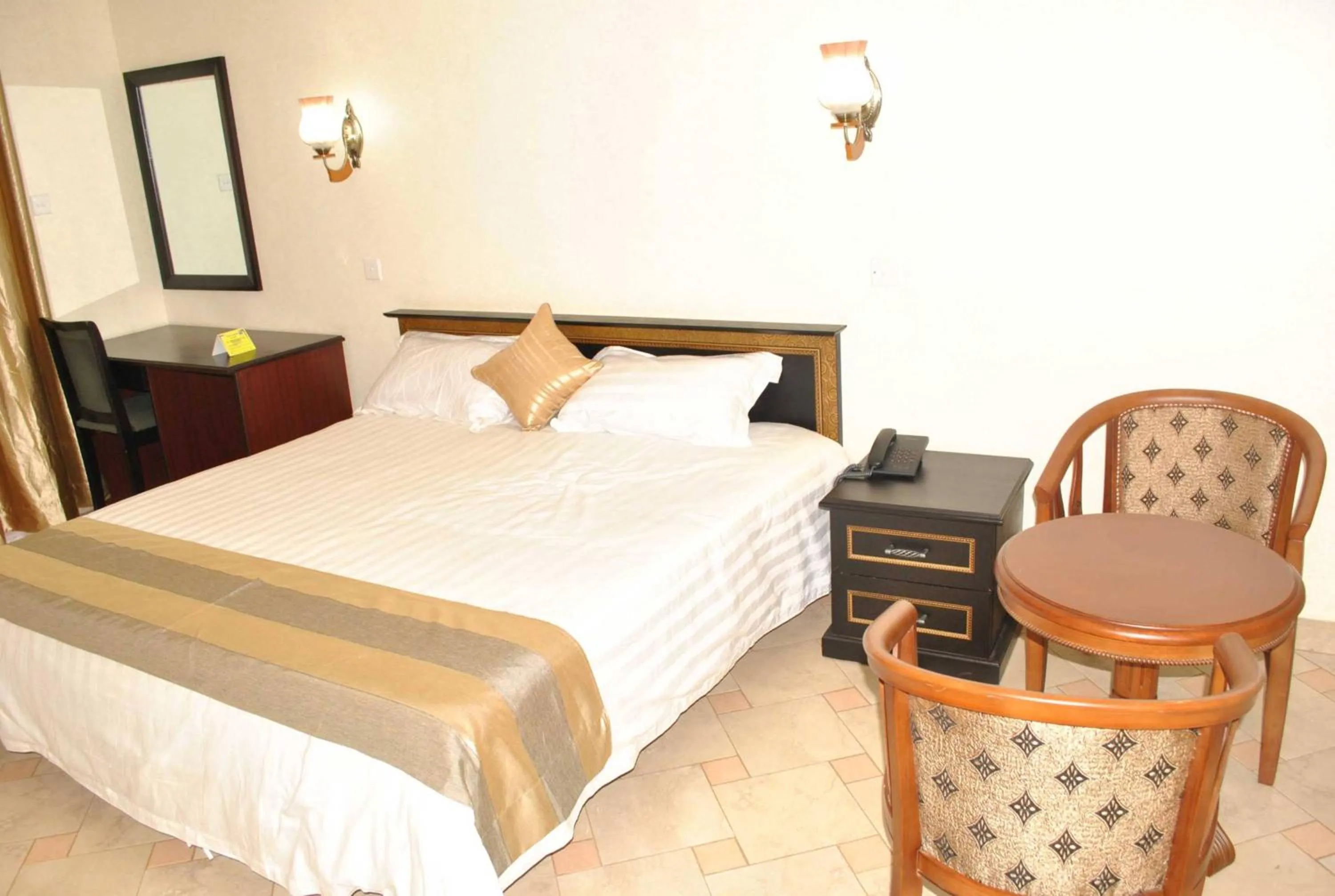 Bed in Tristar Hotel Kampala