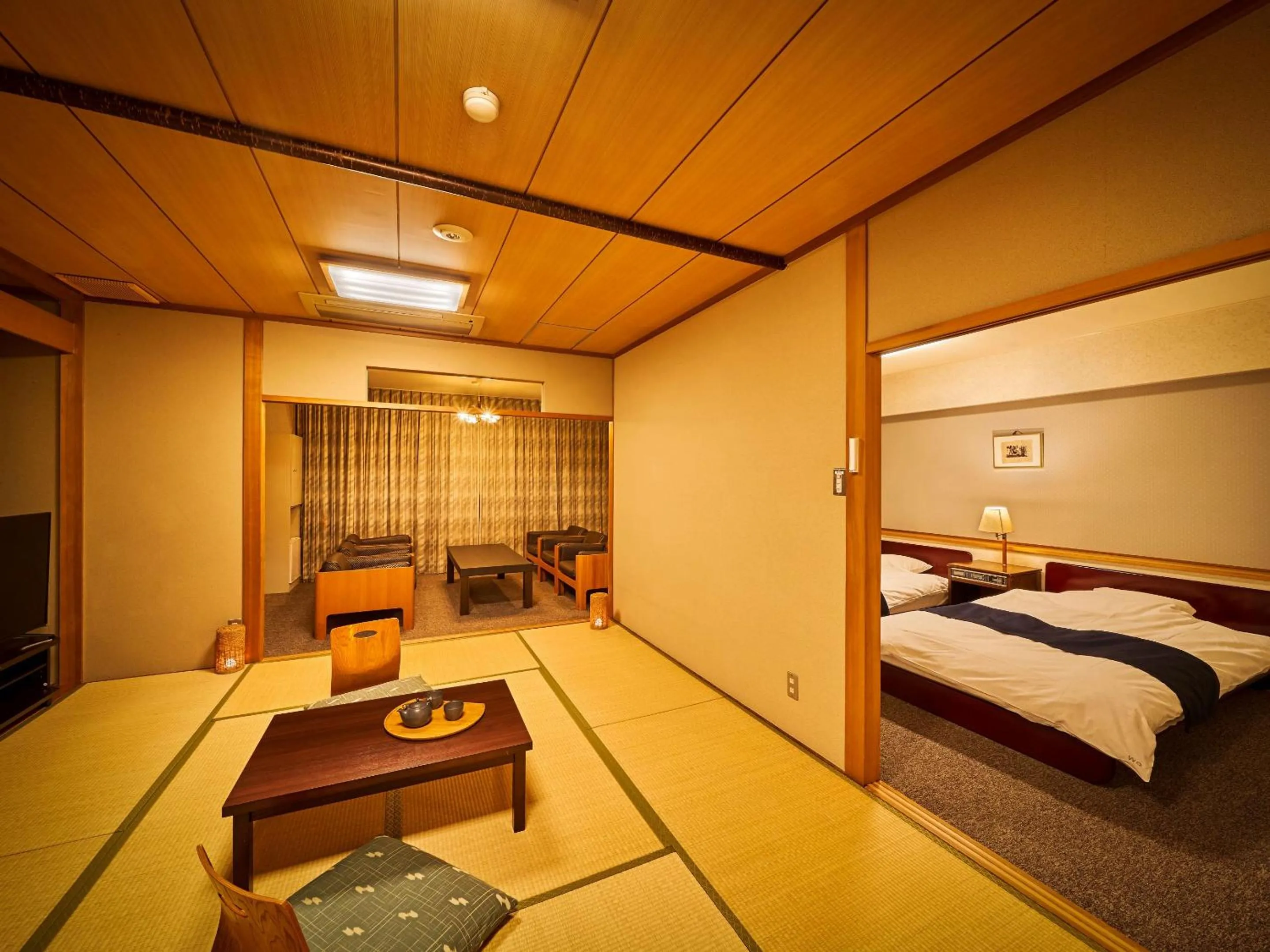 Photo of the whole room, Bed in Yukai Resort Dogo Saichoraku
