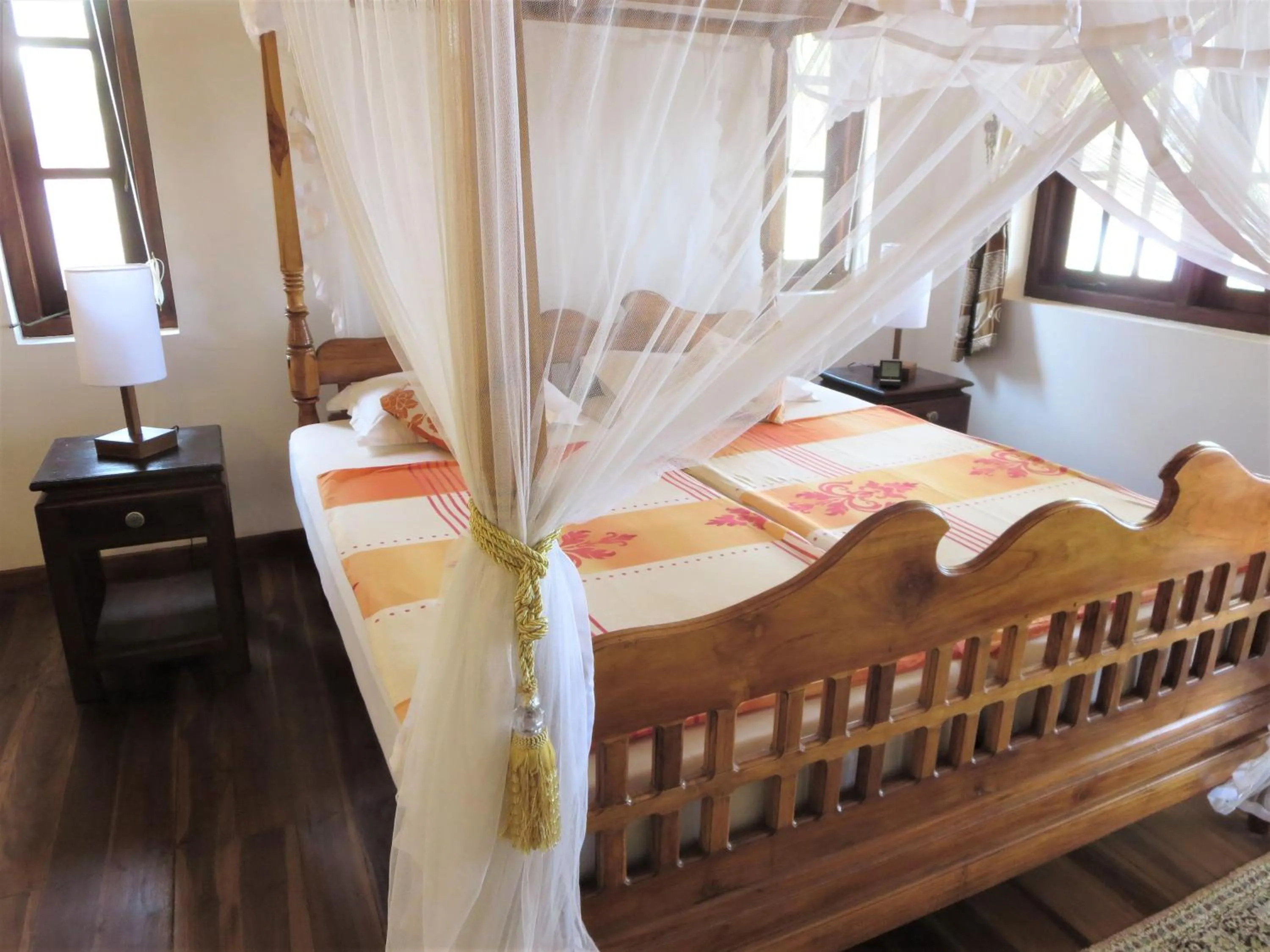 Bed in Lanka Beach Boutique Bungalows & Grand Villa