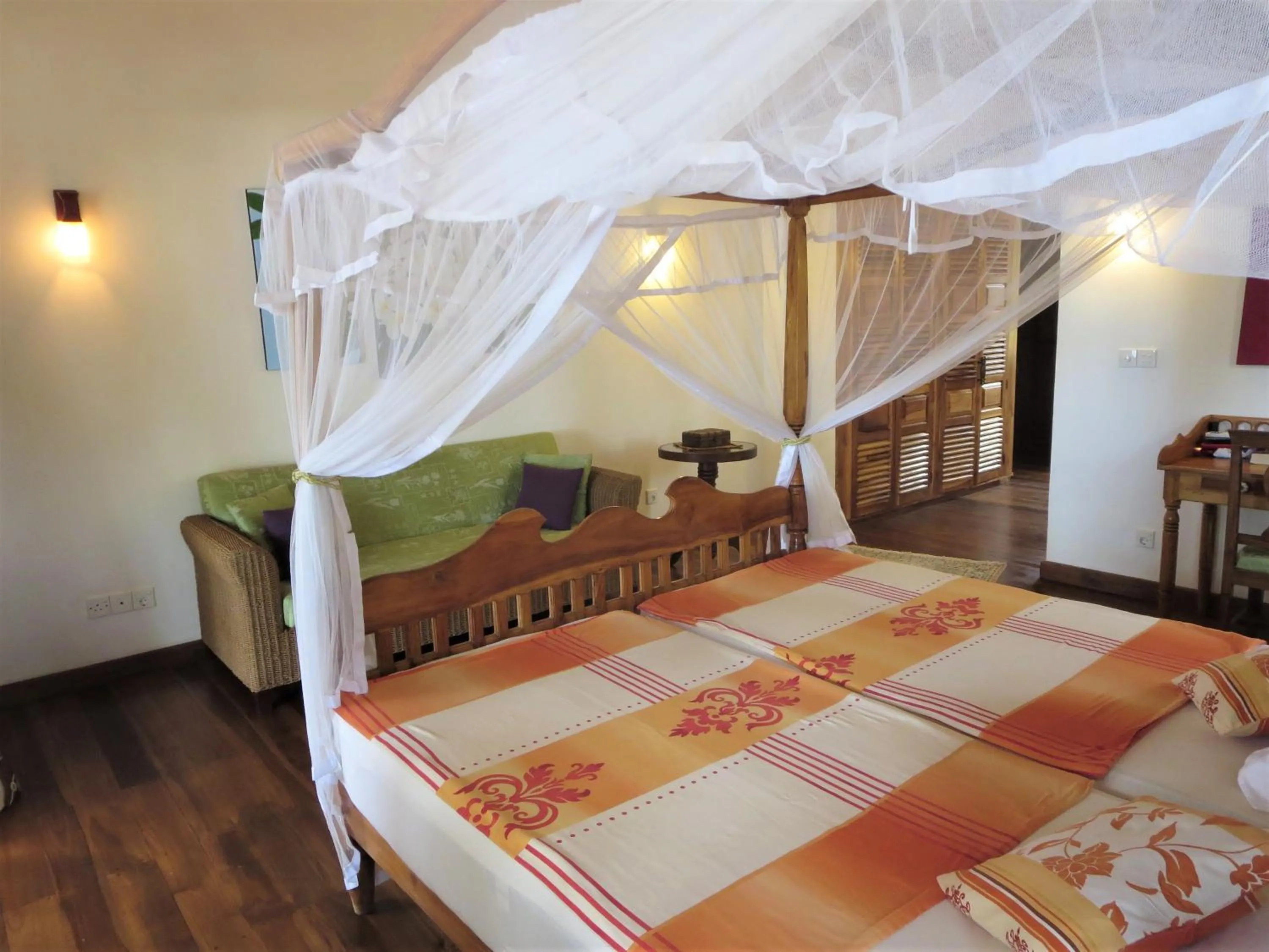 Bed in Lanka Beach Boutique Bungalows & Grand Villa