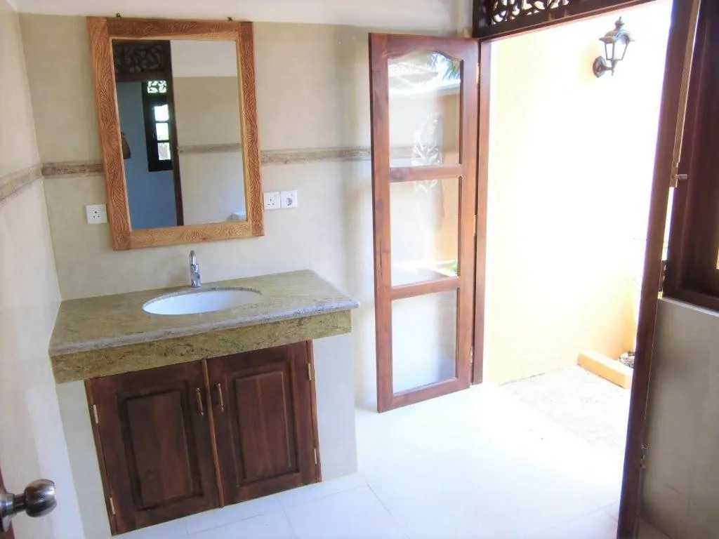 Bathroom in Lanka Beach Boutique Bungalows & Grand Villa