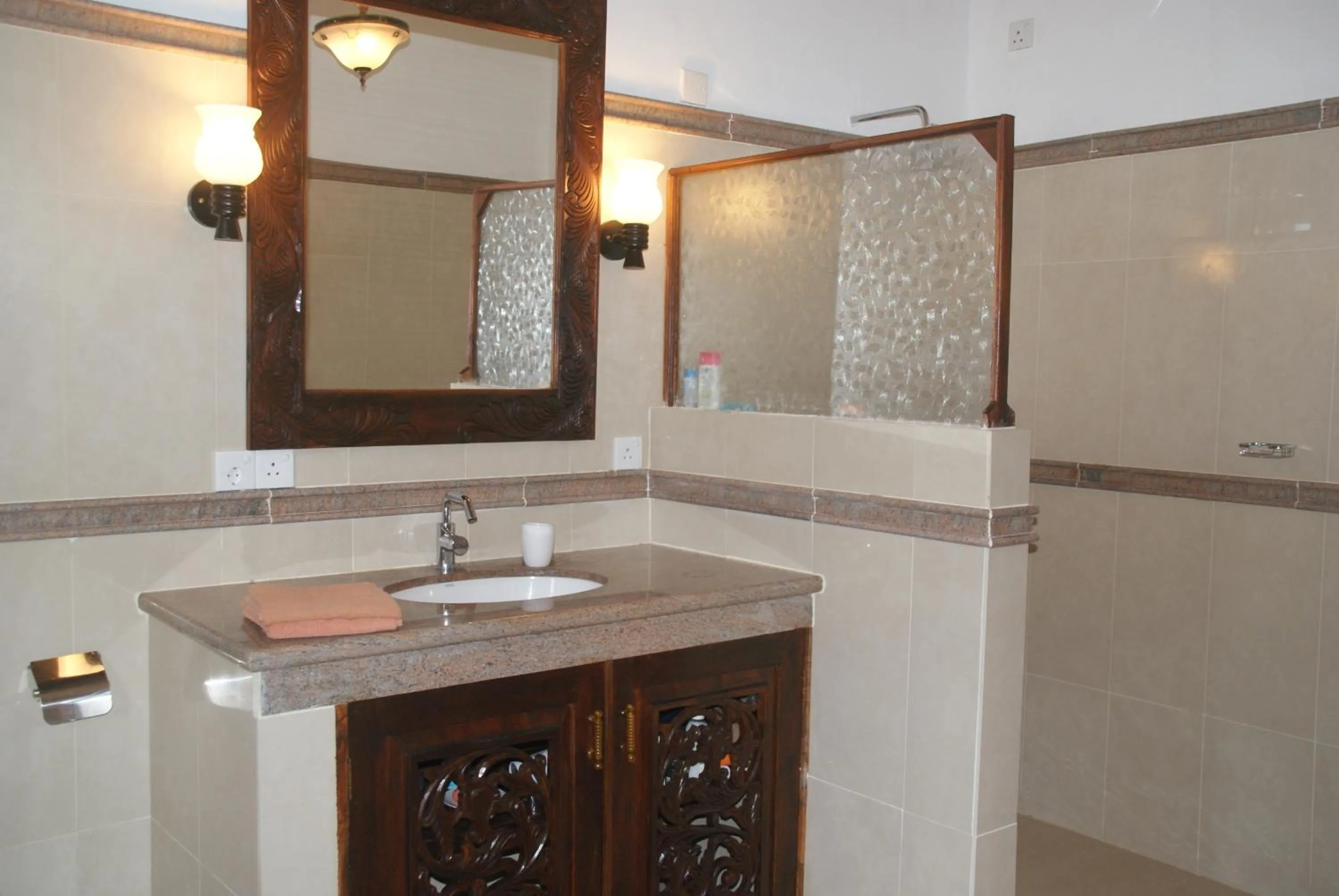 Bathroom in Lanka Beach Boutique Bungalows & Grand Villa
