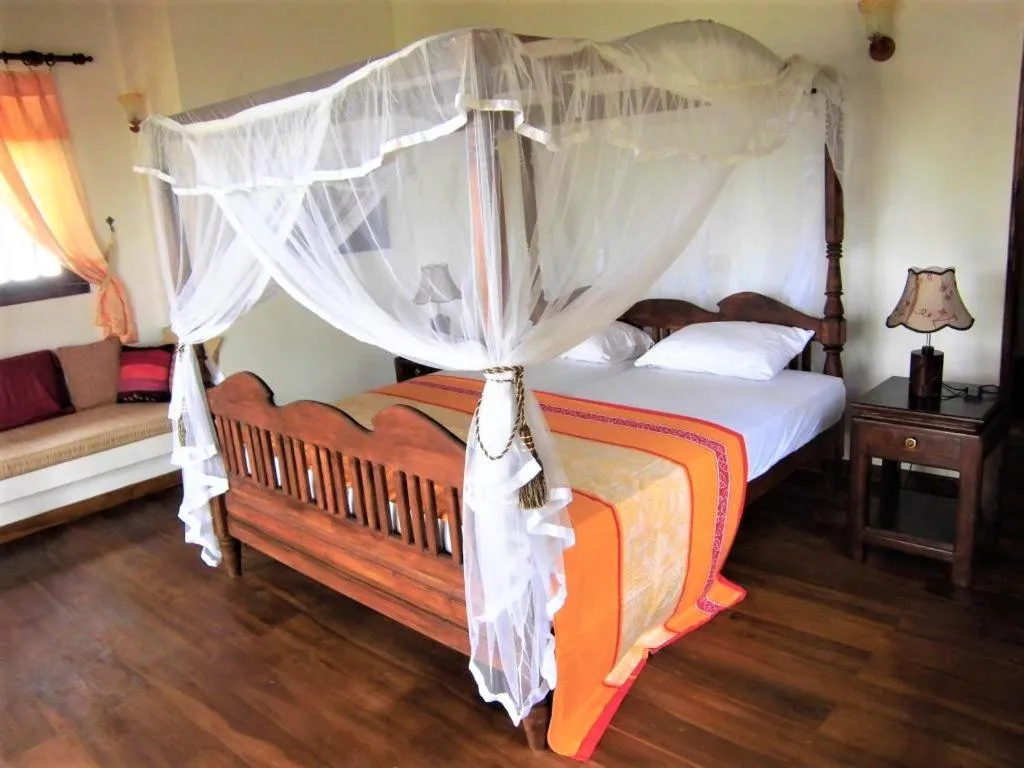 Bed in Lanka Beach Boutique Bungalows & Grand Villa