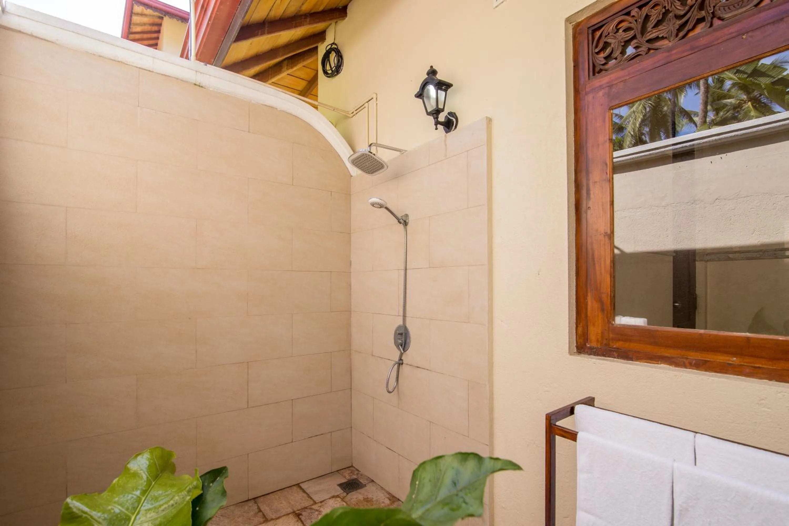 Shower in Lanka Beach Boutique Bungalows & Grand Villa