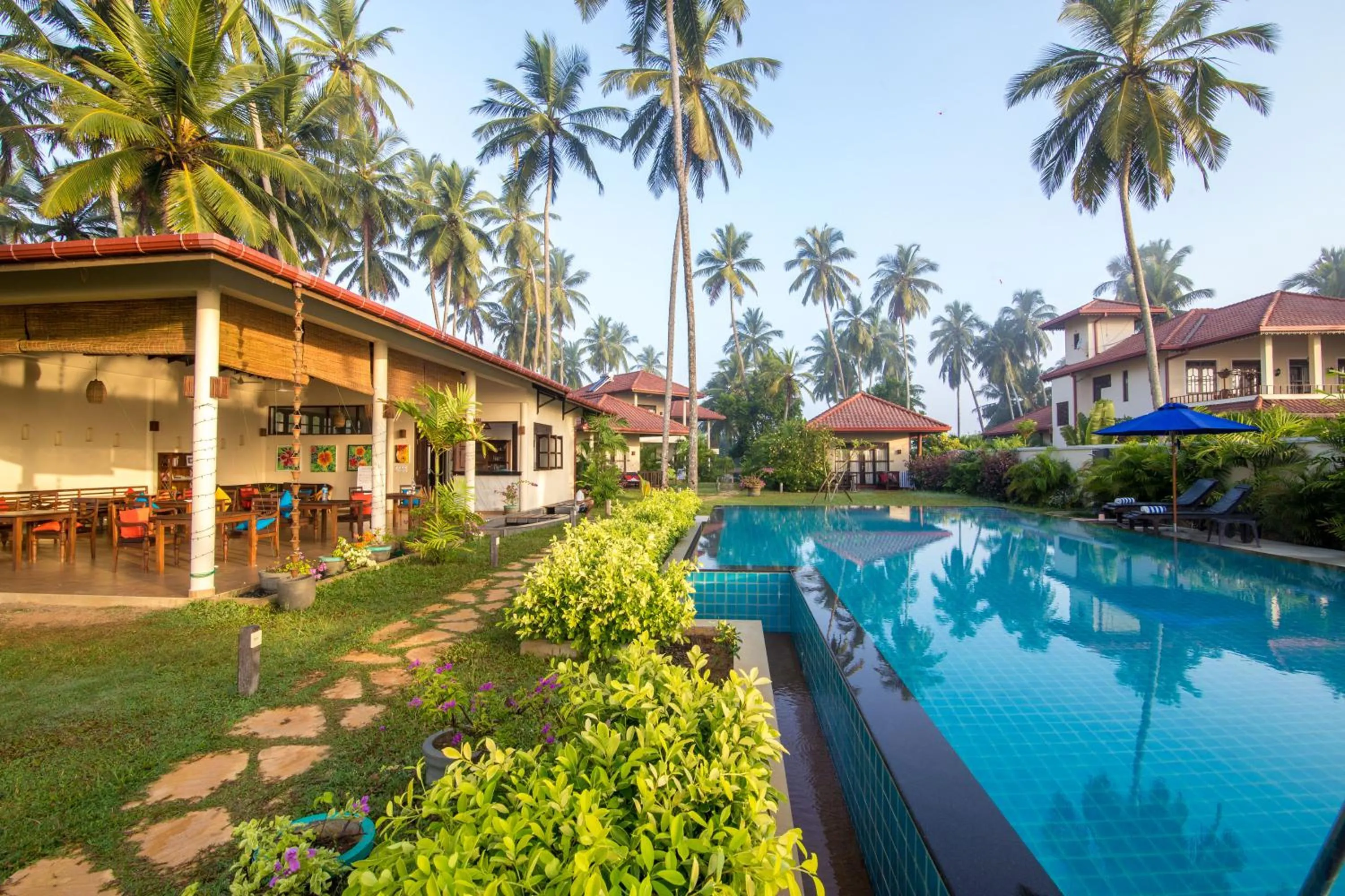 Swimming pool in Lanka Beach Boutique Bungalows & Grand Villa