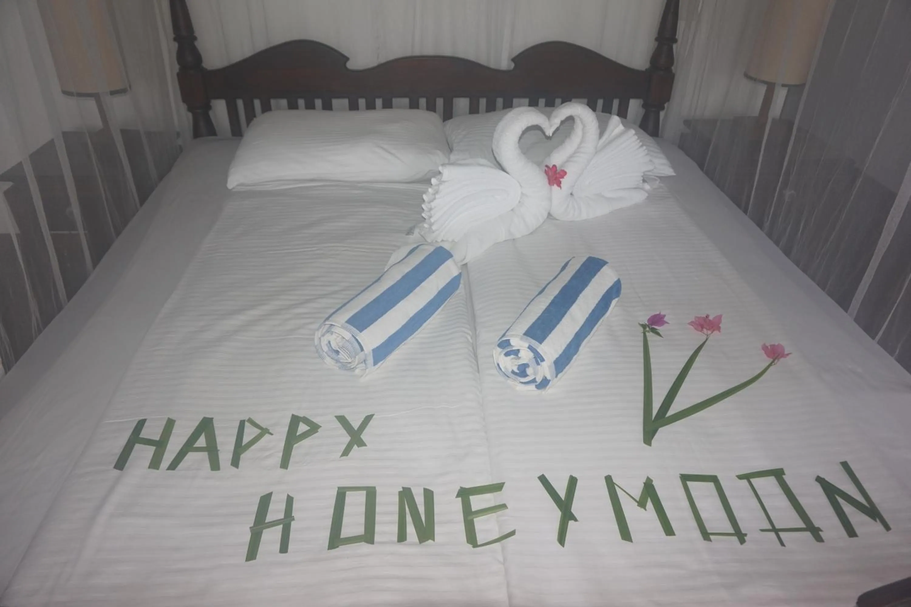 Bed in Lanka Beach Boutique Bungalows & Grand Villa