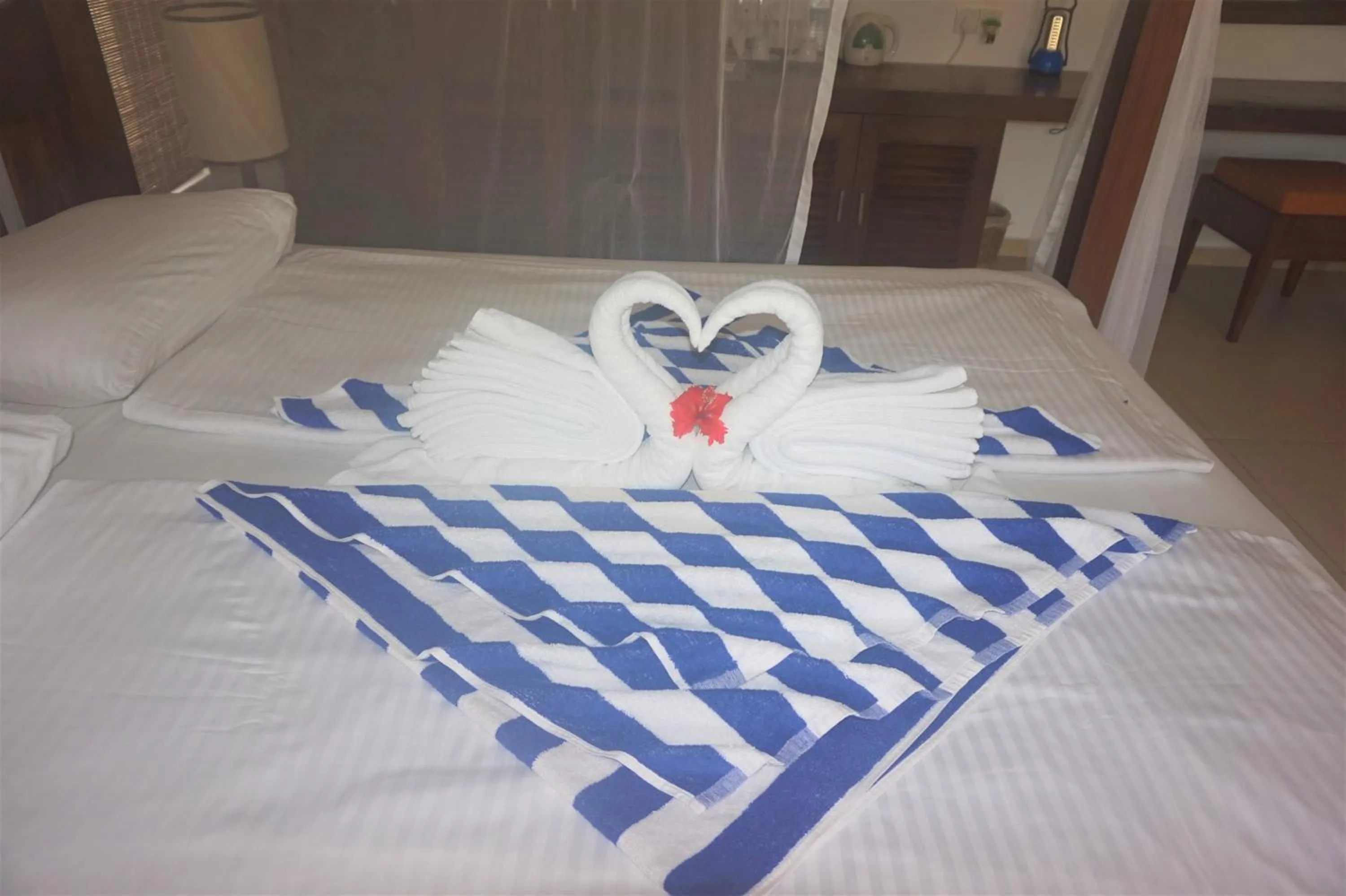 Bed in Lanka Beach Boutique Bungalows & Grand Villa