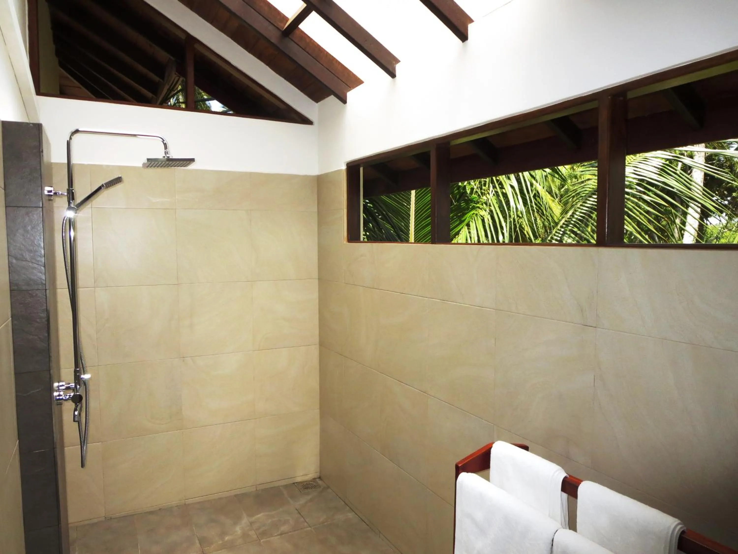 Shower in Lanka Beach Boutique Bungalows & Grand Villa