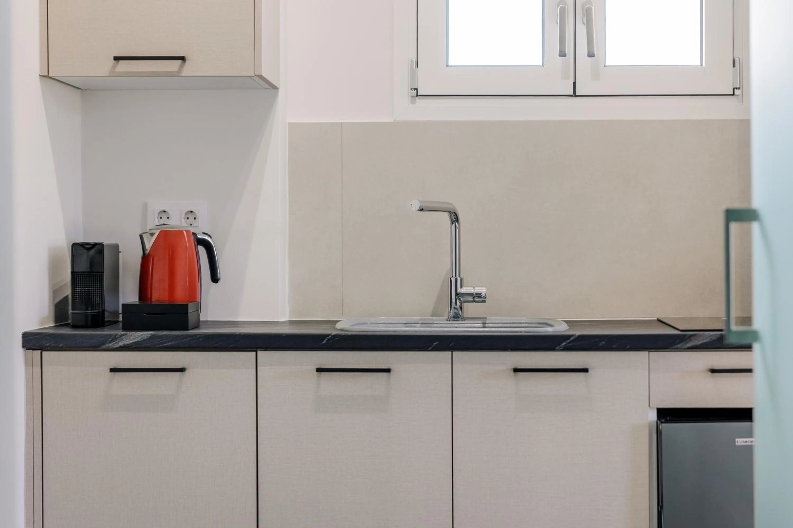 Kitchen or kitchenette in Noa Suites