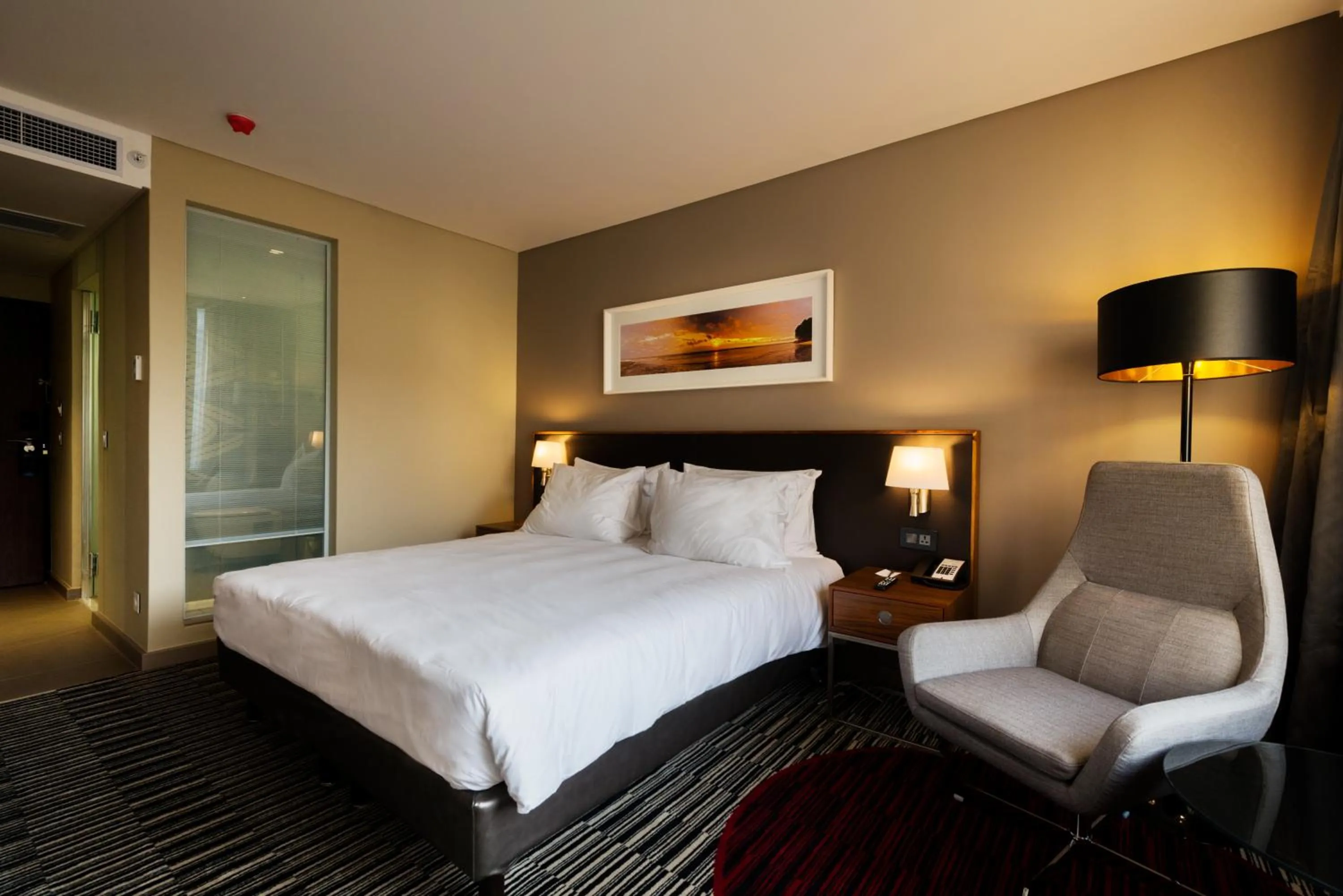 Photo of the whole room, Bed in Radisson Blu Okoume Palace Hotel, Libreville