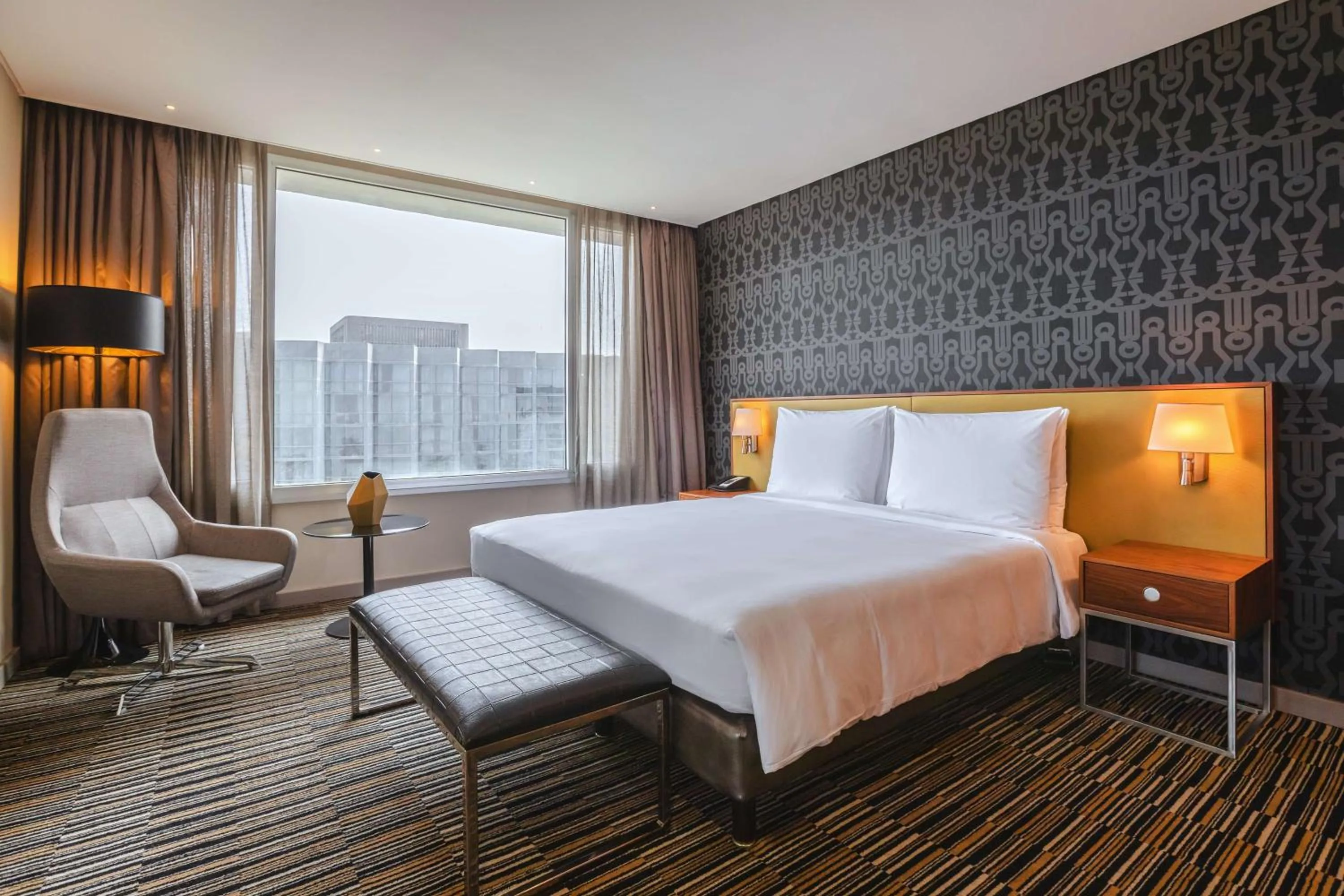 Photo of the whole room, Bed in Radisson Blu Okoume Palace Hotel, Libreville